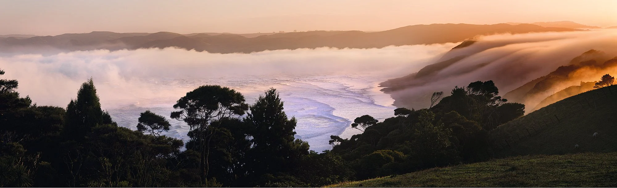 WATERFALL MIST

Morning fog cascading down the cliff face and out through the harbour onto Ngarunui Beach. Like a waterfall of mist spilling over the landscape. Captured in Raglan, NZ.

Limited Edition Fine Art Print. Click to view sizes