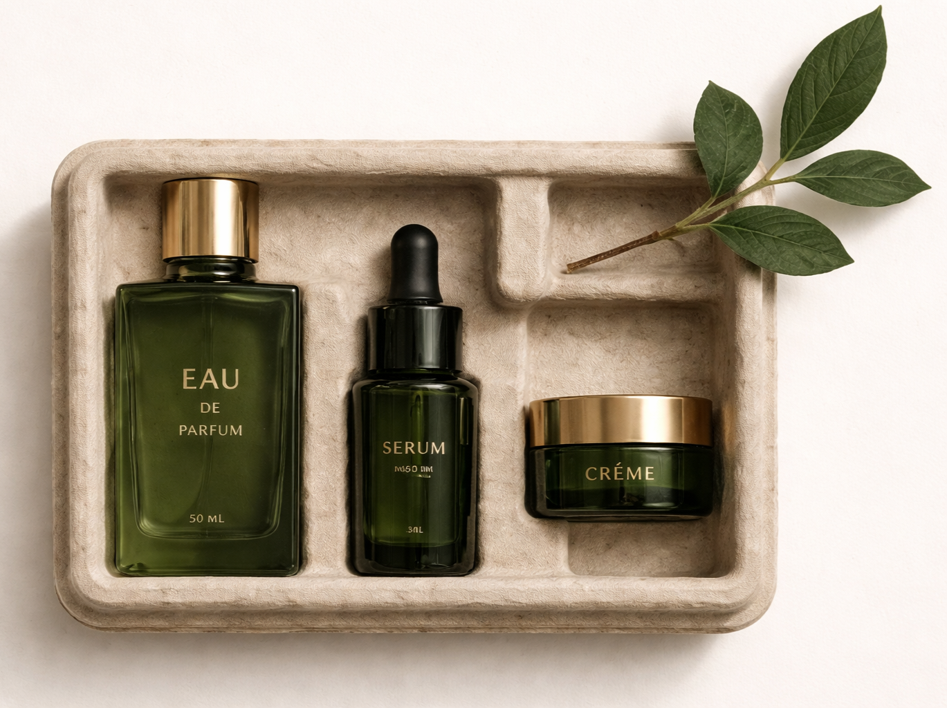Green skincare product bottles with gold accents in a beige tray, accompanied by a green branch with leaves.