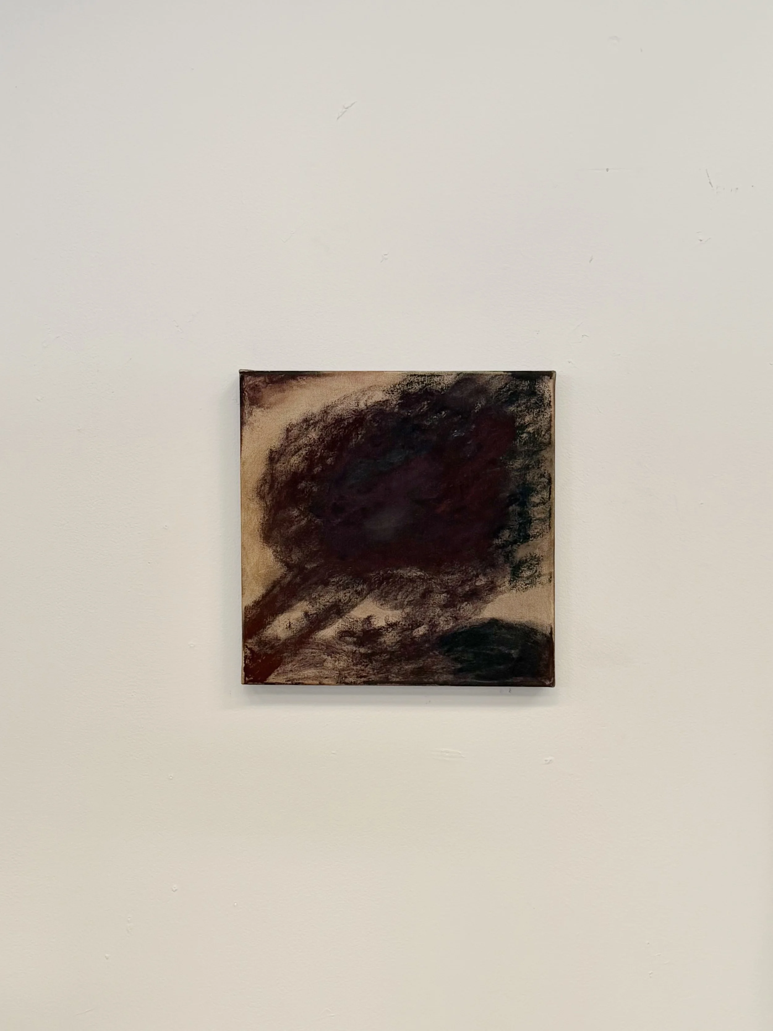 Abstract painting with dark and reddish-brown colors on a light background.