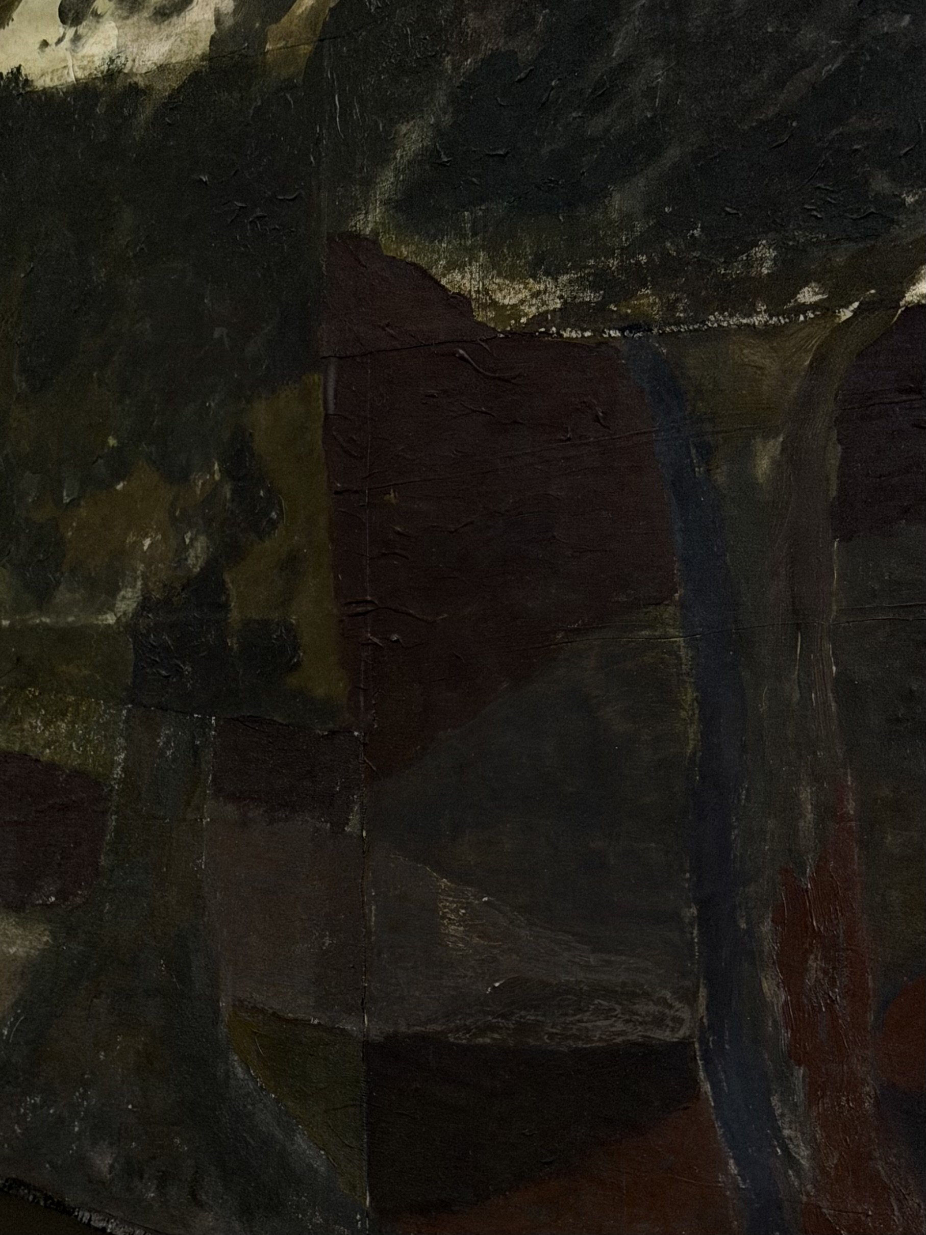 Close-up of painted wooden planks featuring dark colors with black, brown, and hints of yellow and green, showing visible brush strokes and texture.