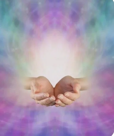 Two cupped hands with a glowing, colorful, abstract background.