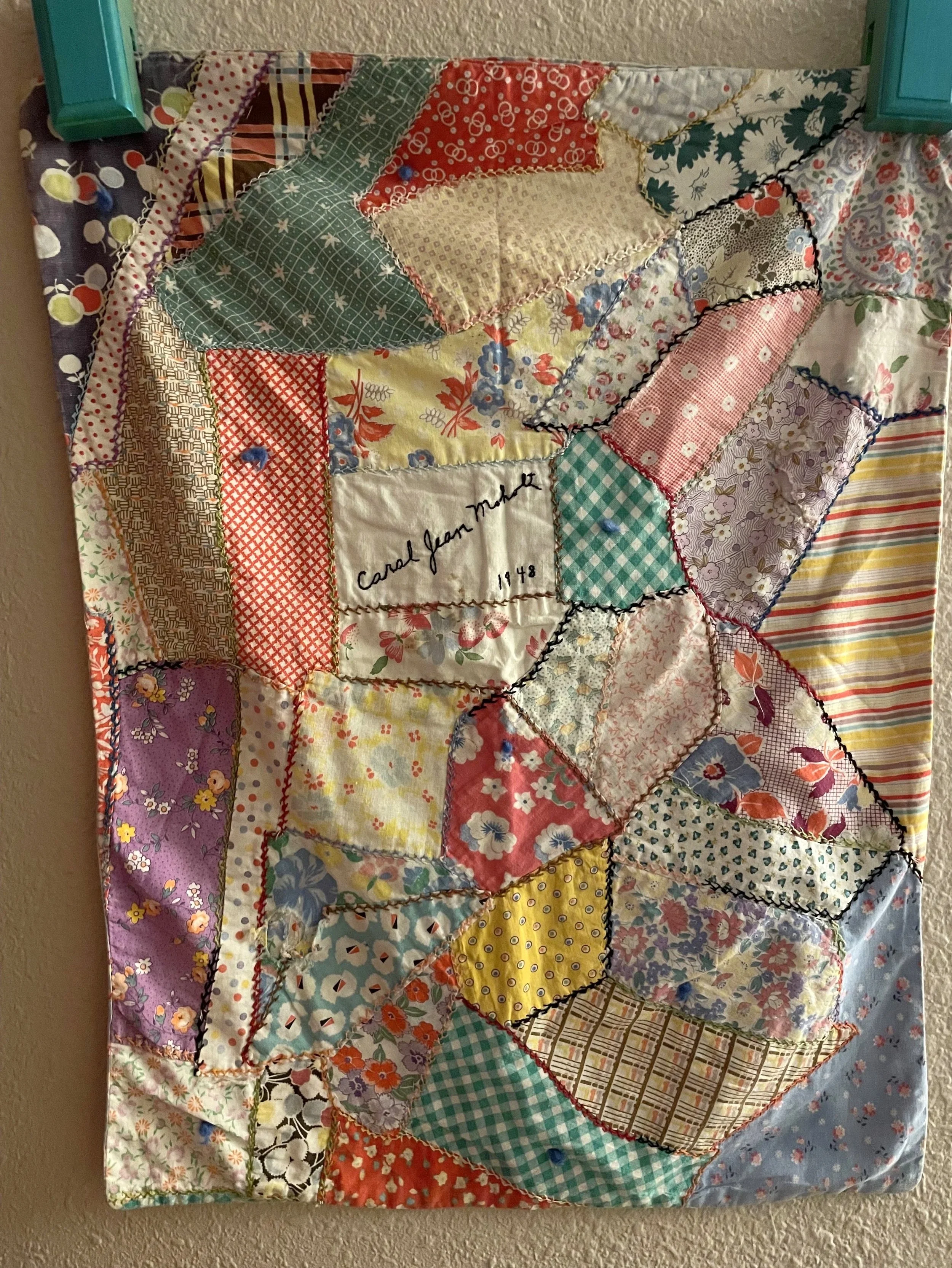 My Great Grandma Bessie made this doll blanket for my grandmother's 5th birthday.