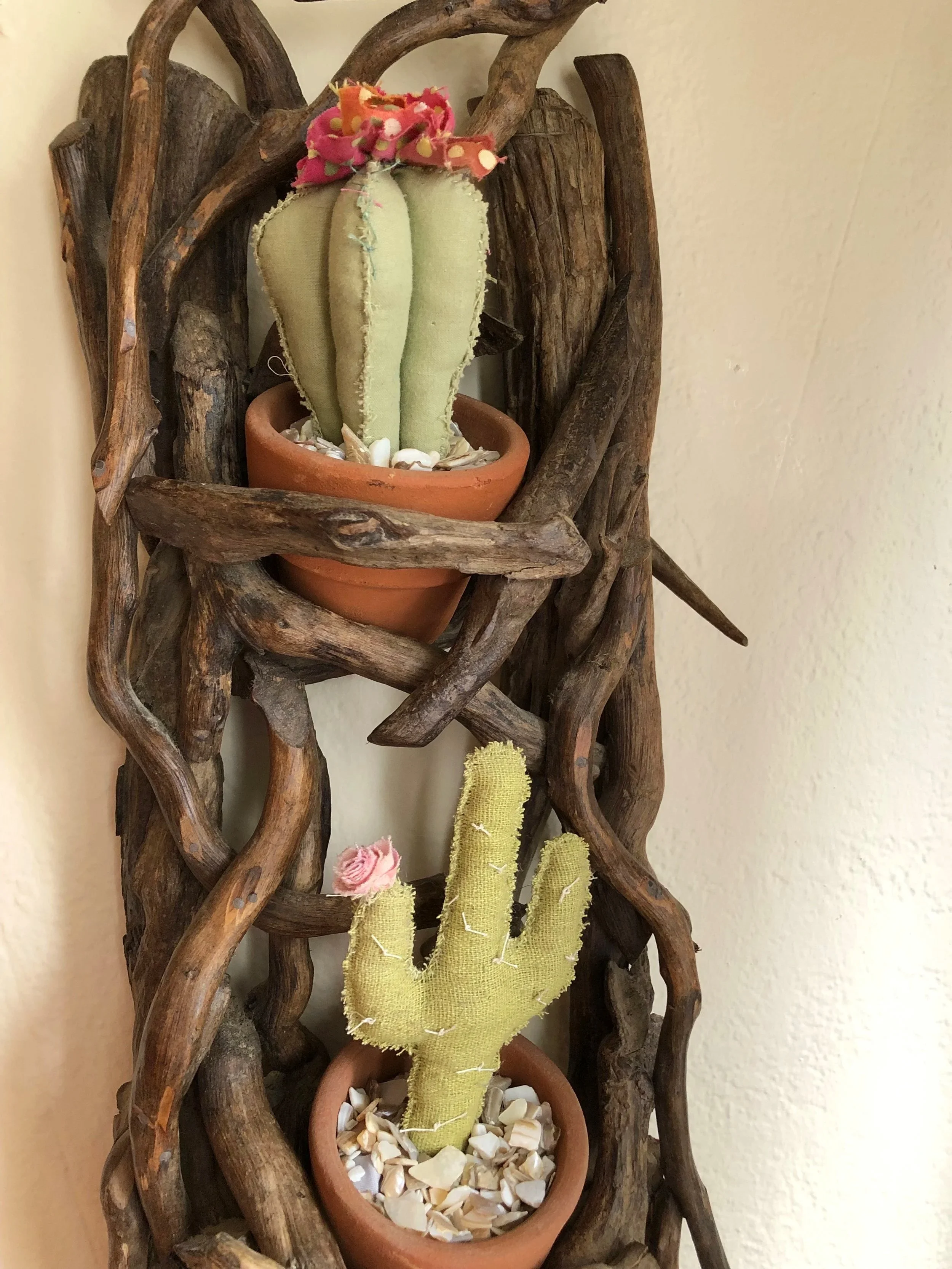 I got tired of killing the plants in this gorgeous holder, so I sewed some replacements. 