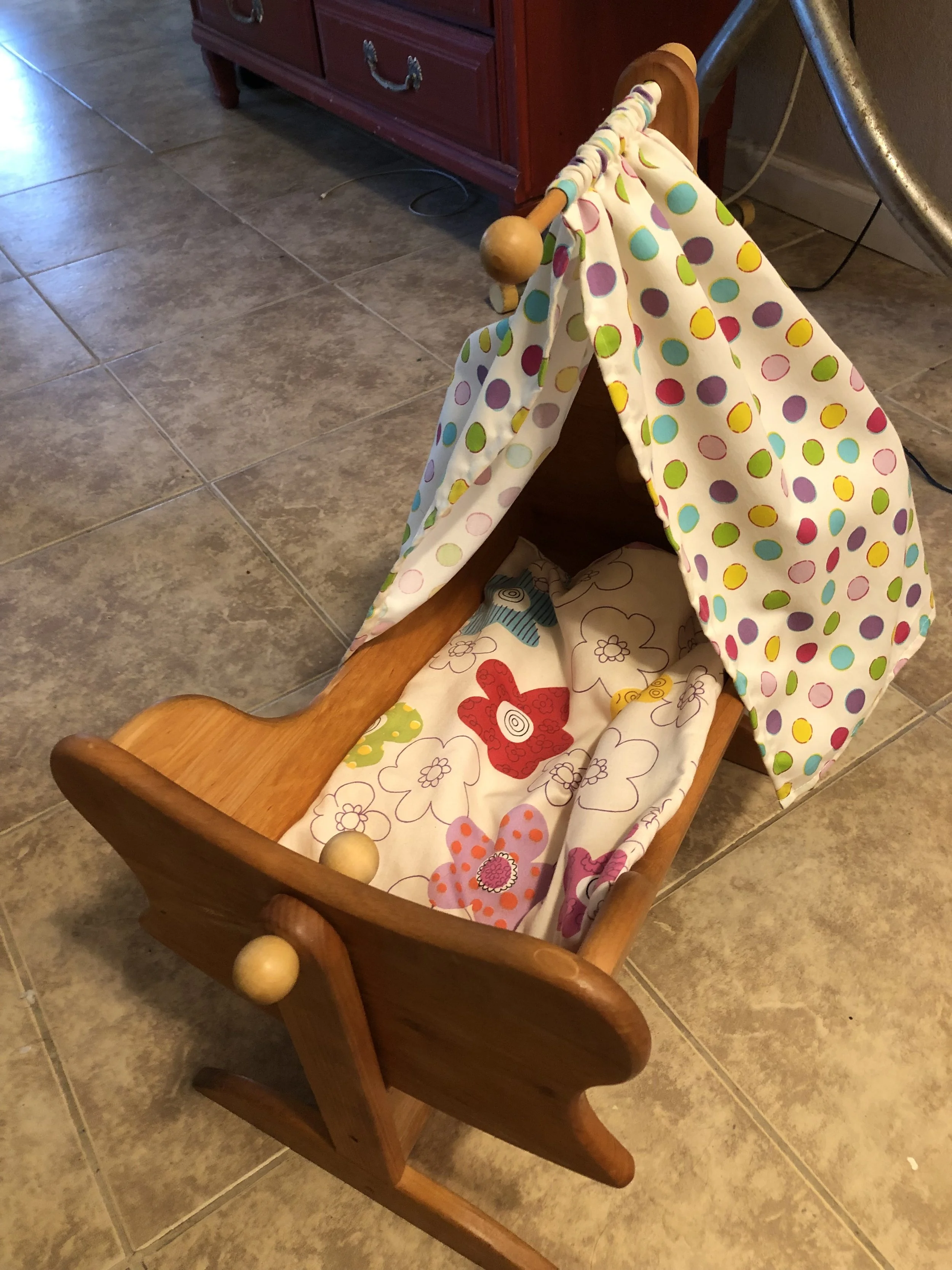 I made new bedding for a second hand doll cradle. 
