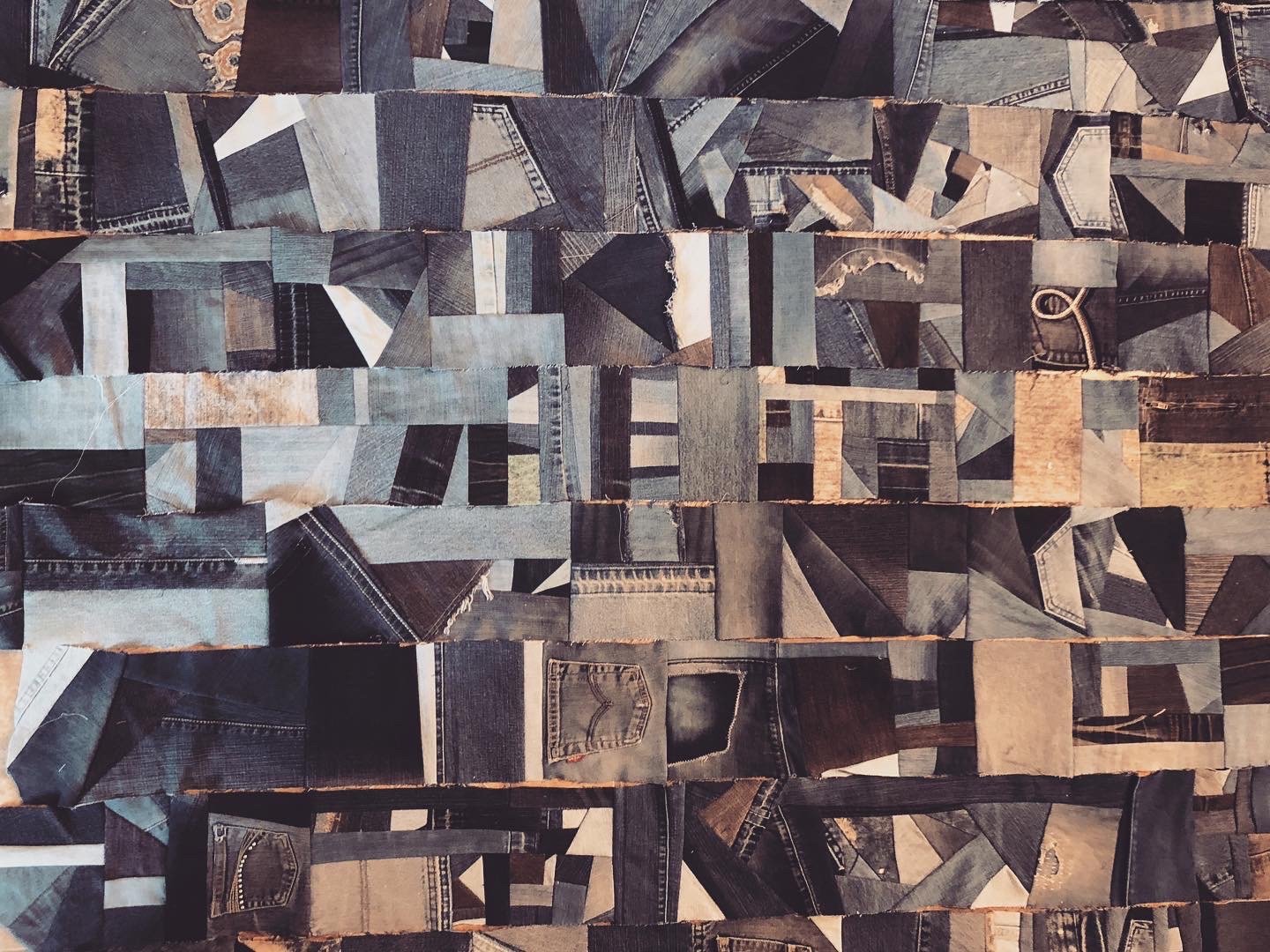 Scrappy denim quilt.