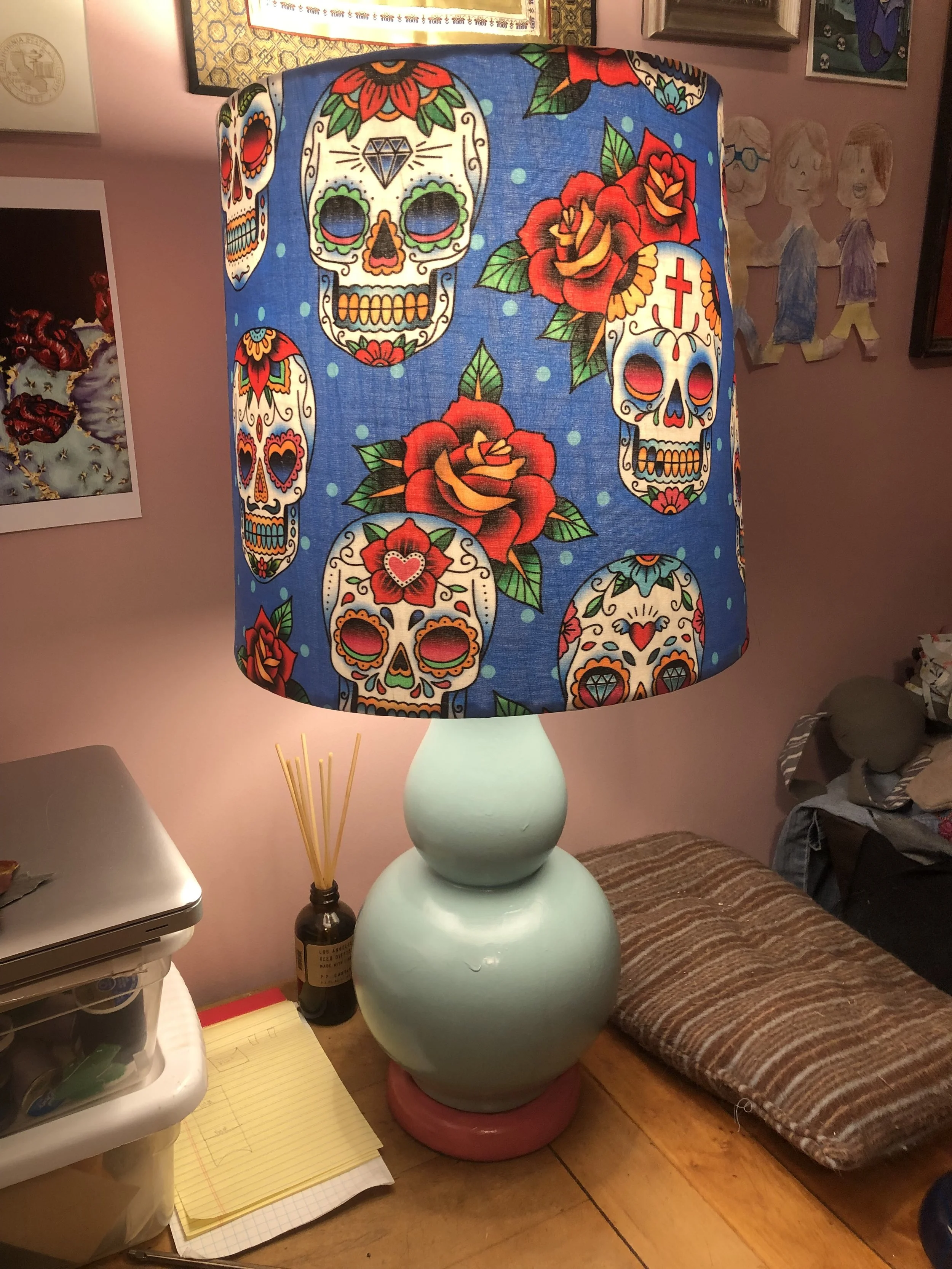 I repainted and re-covered my desk lamp. 
