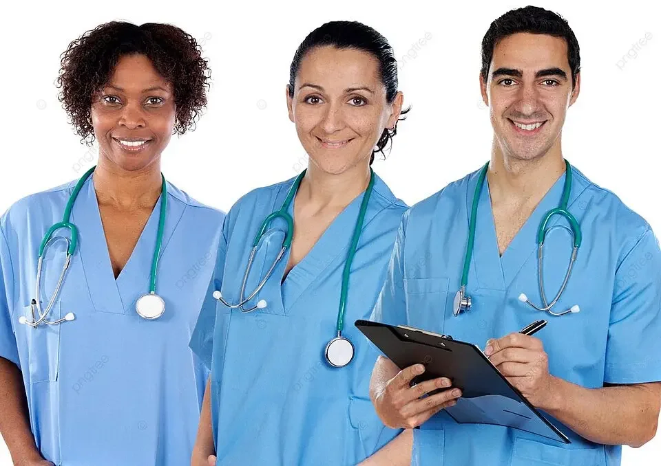 Three healthcare professionals, two women and one man, dressed in blue scrubs with stethoscopes around their necks, smiling and posing for a photo. The man is holding a clipboard and a pen.