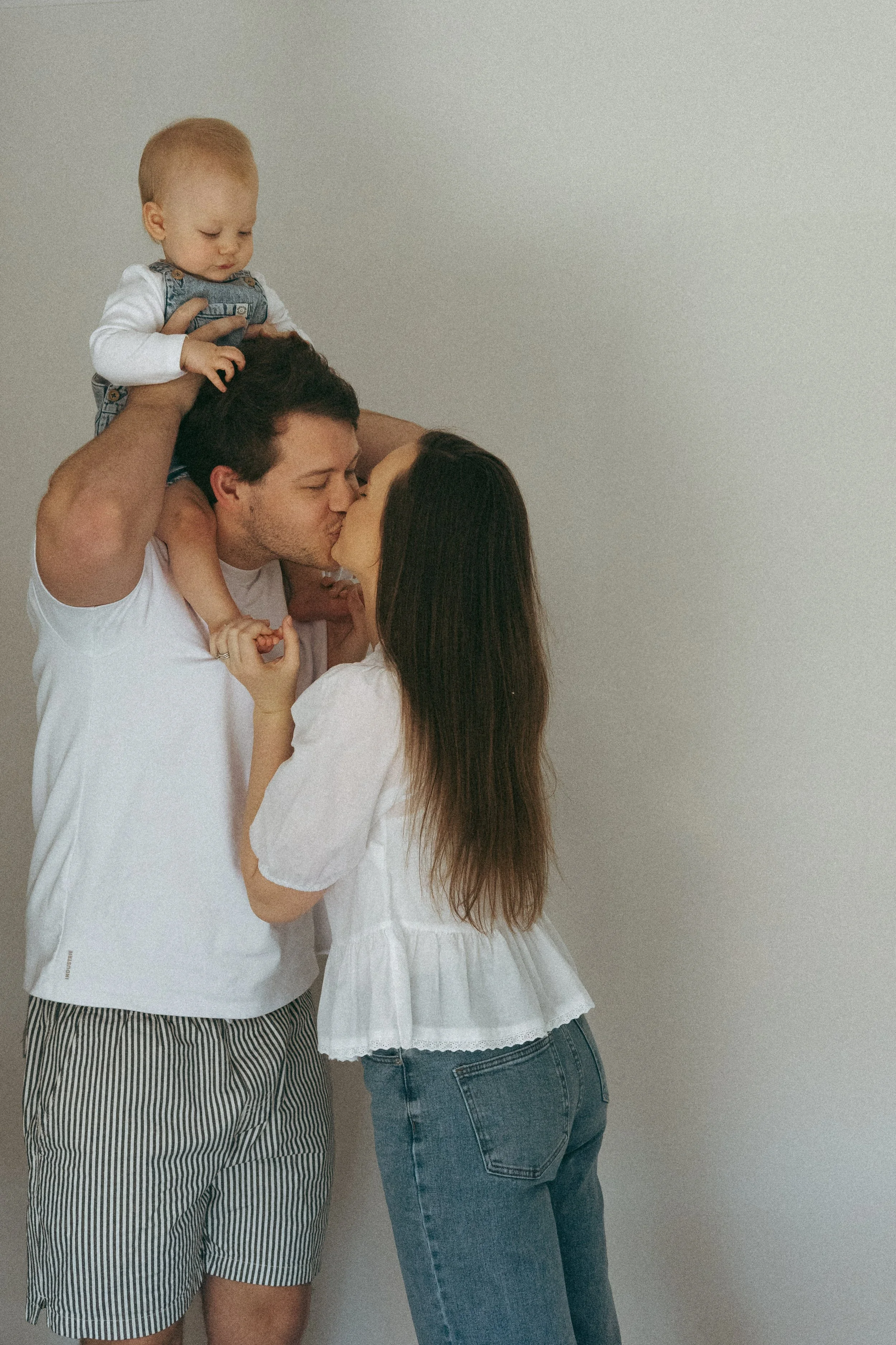 couple embracing at home during relaxed lifestyle couples photography session 