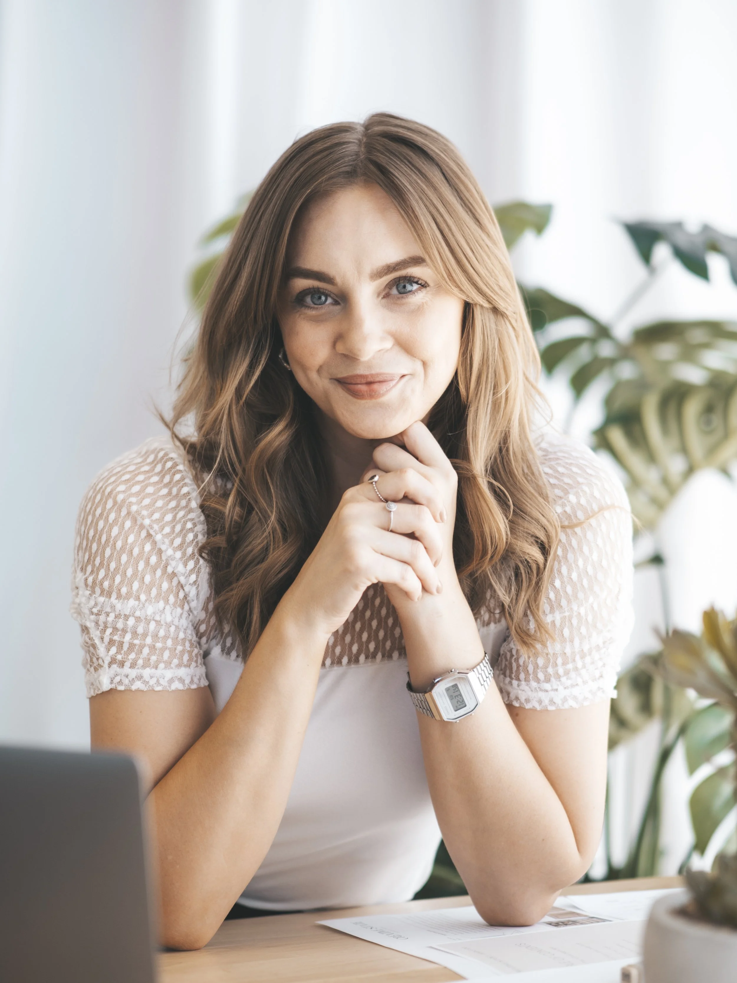 Vanessa, interior designer in Perth and founder of Creative State Studio, working at her desk