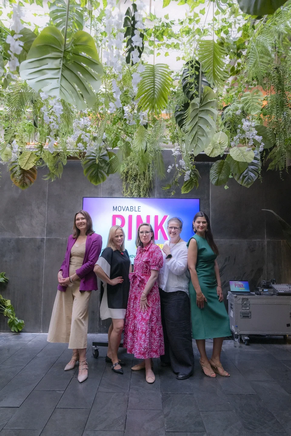 Tatiana Poliakova with fellow speakers at the Movable Pink women's leadership event.