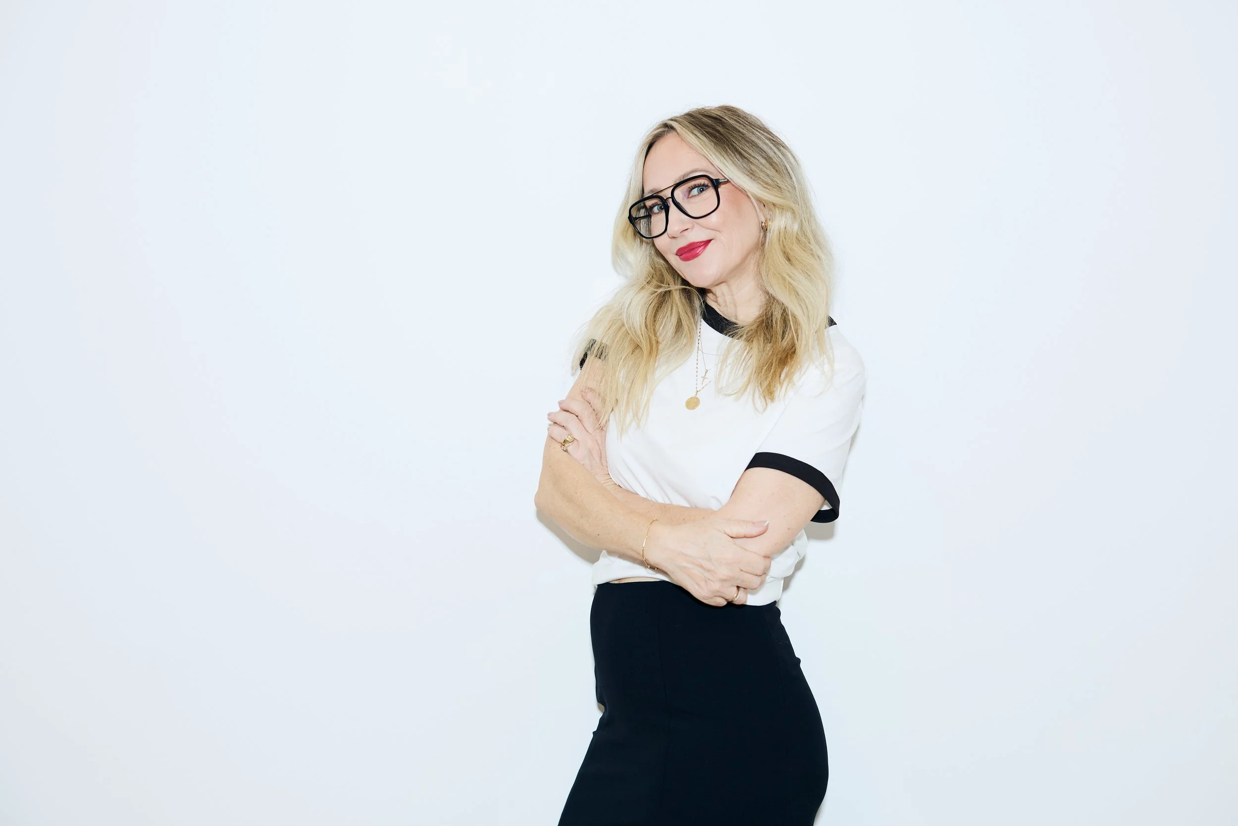 Danielle Butcher makeup artist wearing red lipstick June campaign