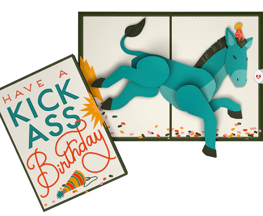A pop-p birthday card with the message "Have a Kick Ass Birthday" on the cover and a pop up donkey kicking on the inside of the card.