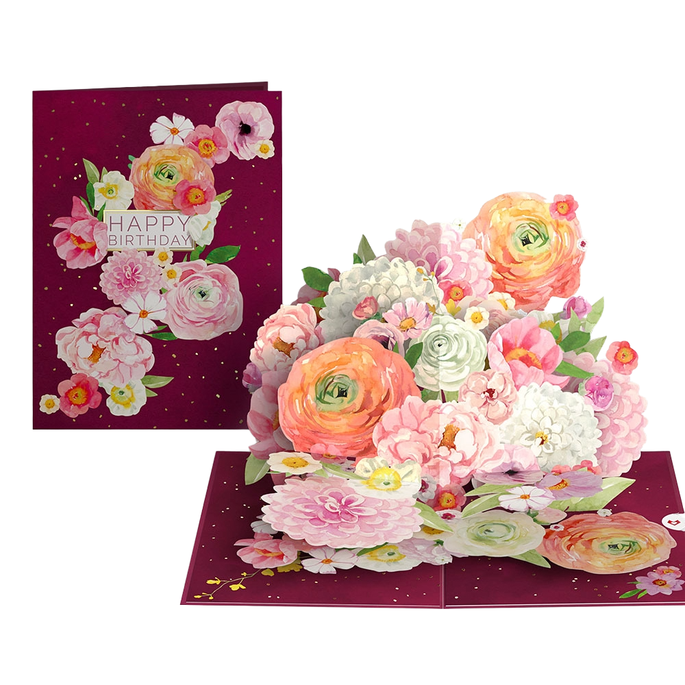 A 3D floral pop-up birthday card with pink, white, and peach flowers and green leaves, featuring a "HAPPY BIRTHDAY" message on the front.