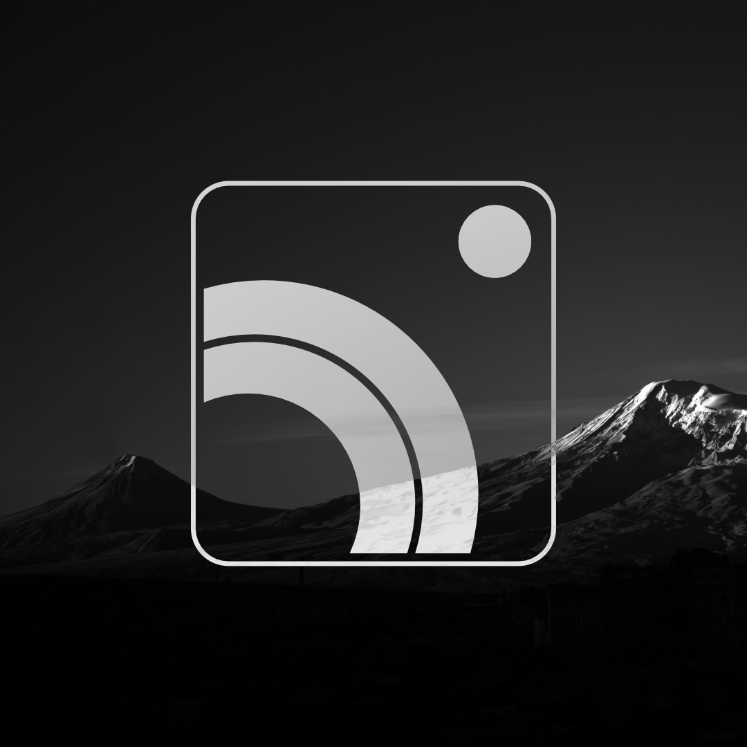 Black and white landscape photo of snow-capped mountains with a dark sky, overlaid with a transparent Instagram logo.