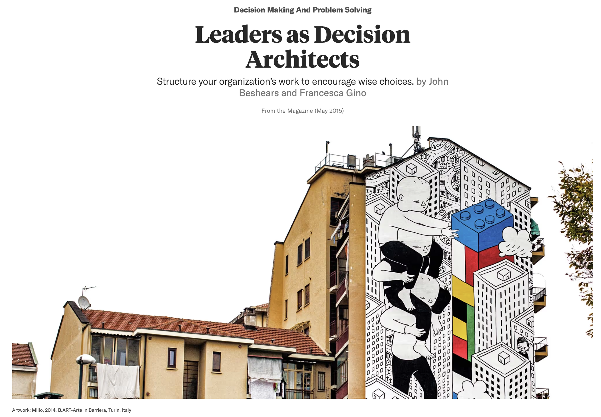 Colorful mural on the side of a building depicting children playing with building blocks amidst cityscape illustrations, with the quote "Leaders as Decision Architects."