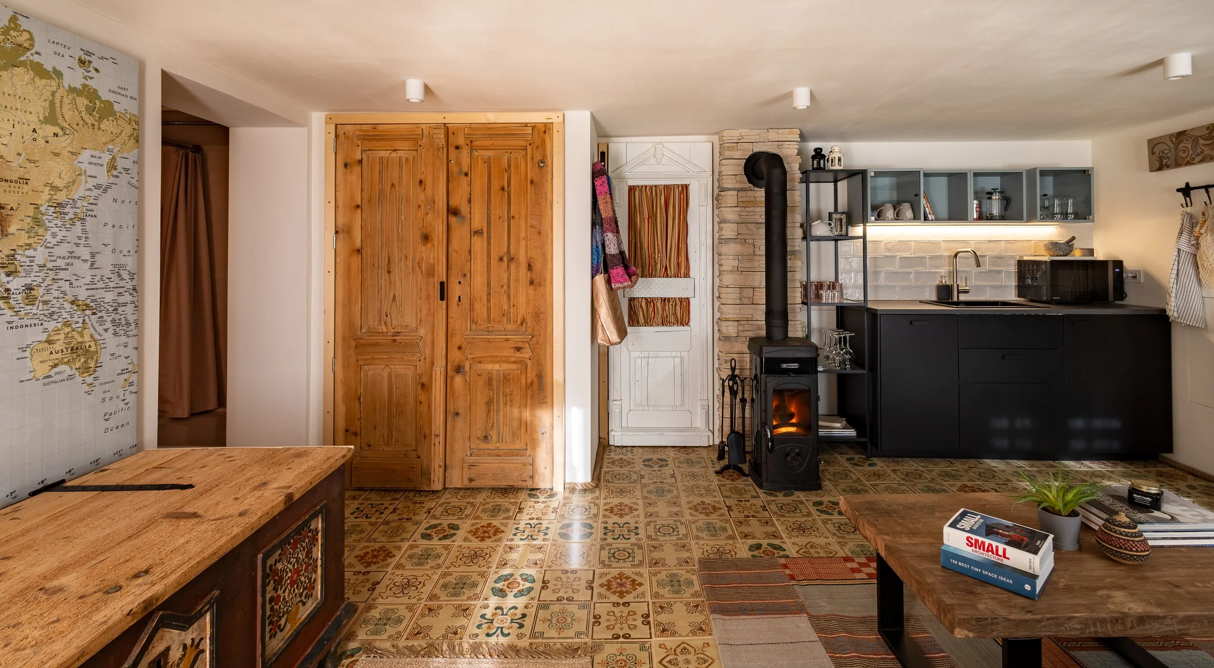 Reclaimed doors and antique chest, living room vineyard cottage Bizelsko Slovenia