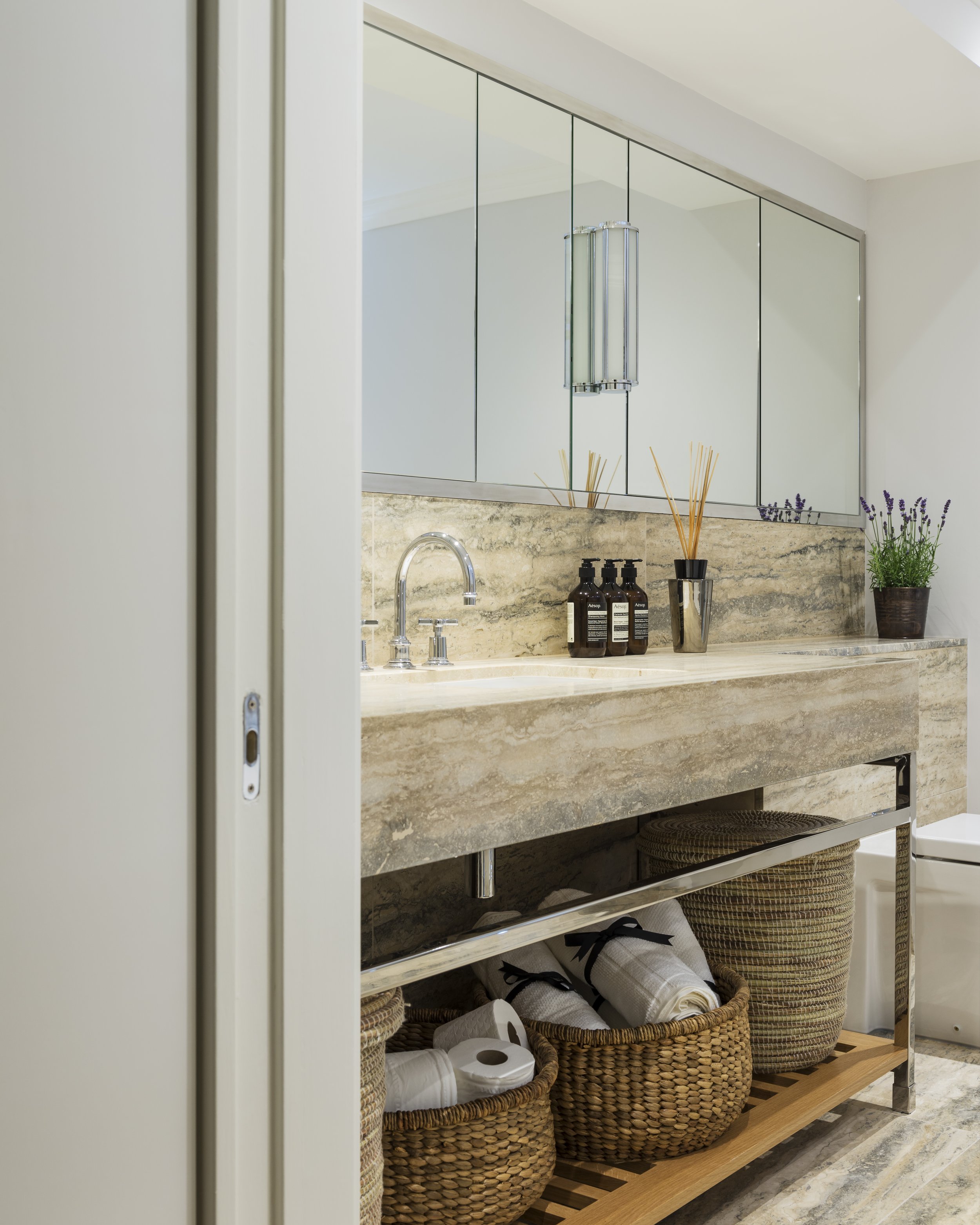 Travertine and chrome bathroom vanity Lennox Gardens apartment Knightsbridge