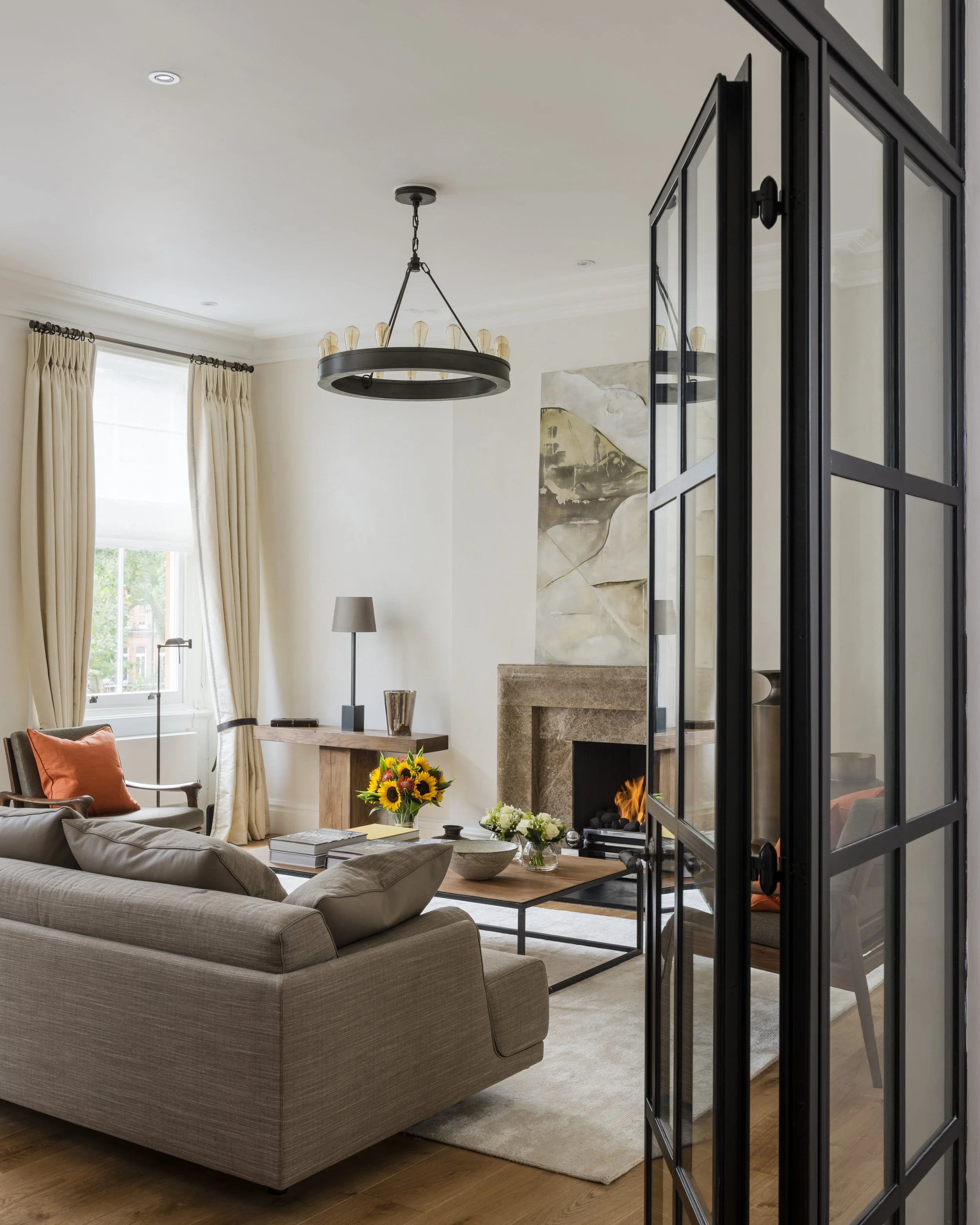 Living room through Crittal glass doors, Lennox Gardens apartment Knightsbride