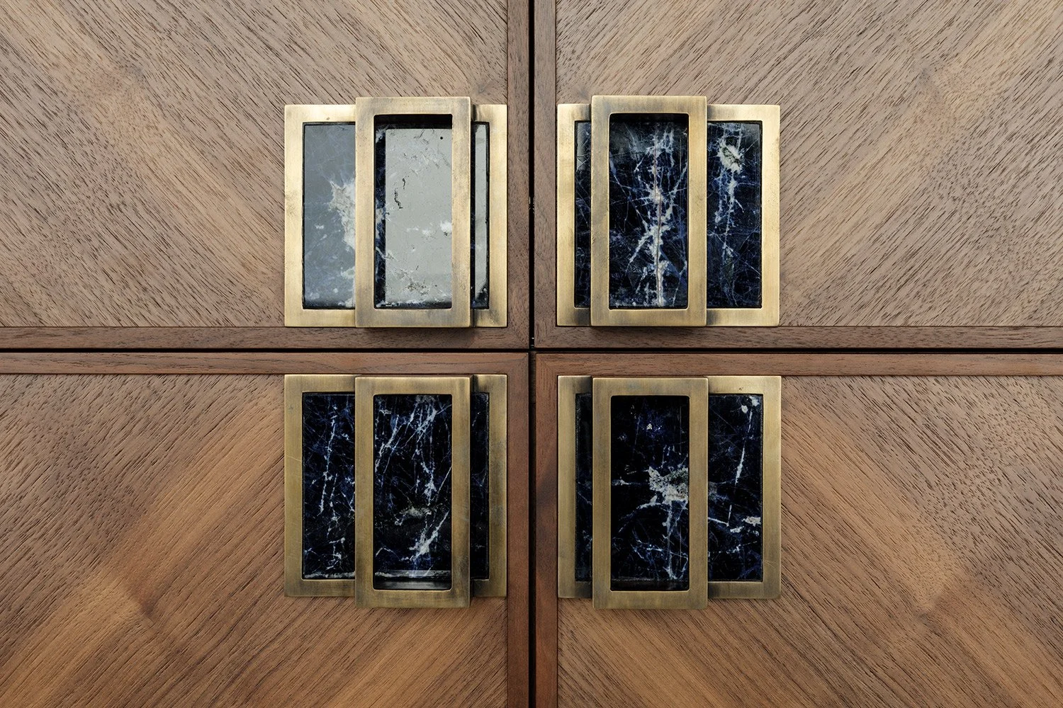 Walnut cabinet with bespoke brass and sodalite handles detail