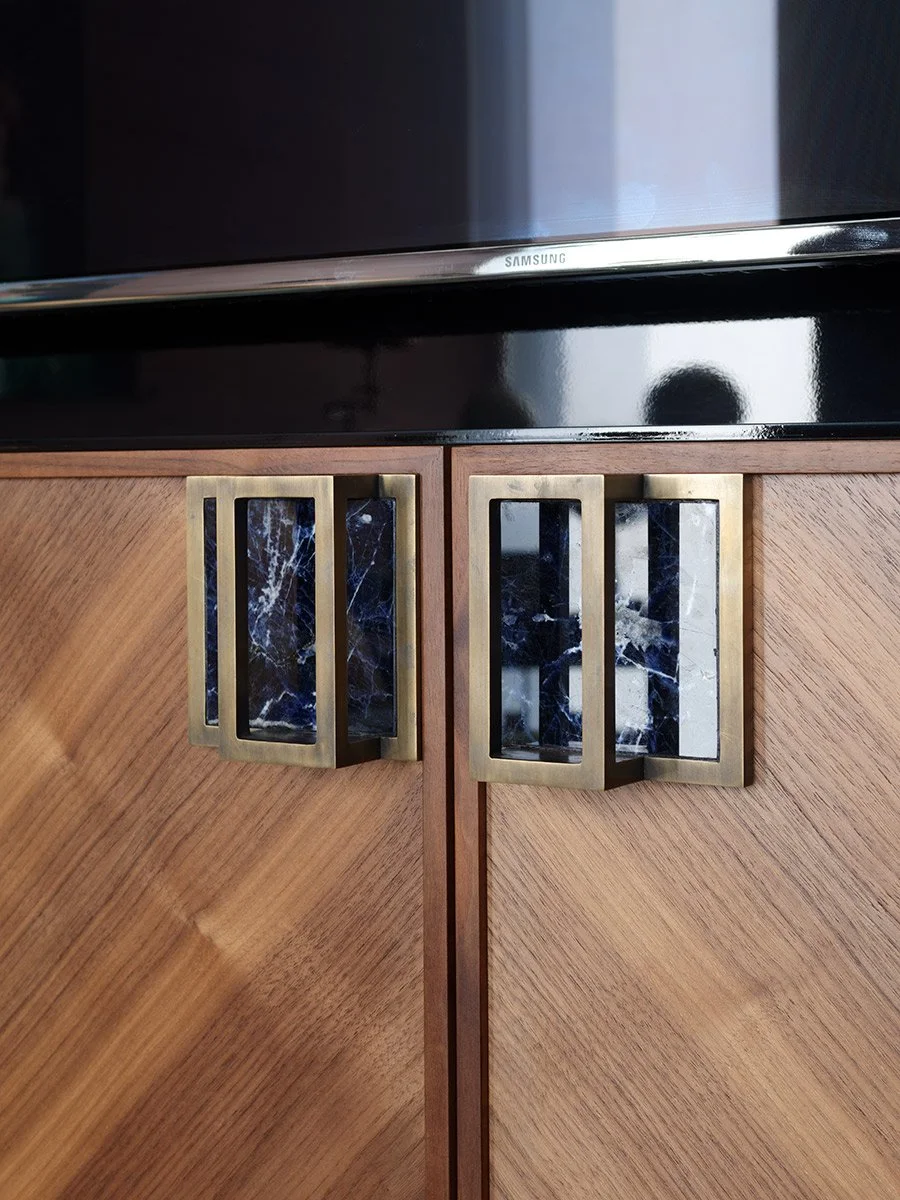 Walnut cabinet open with handle detail