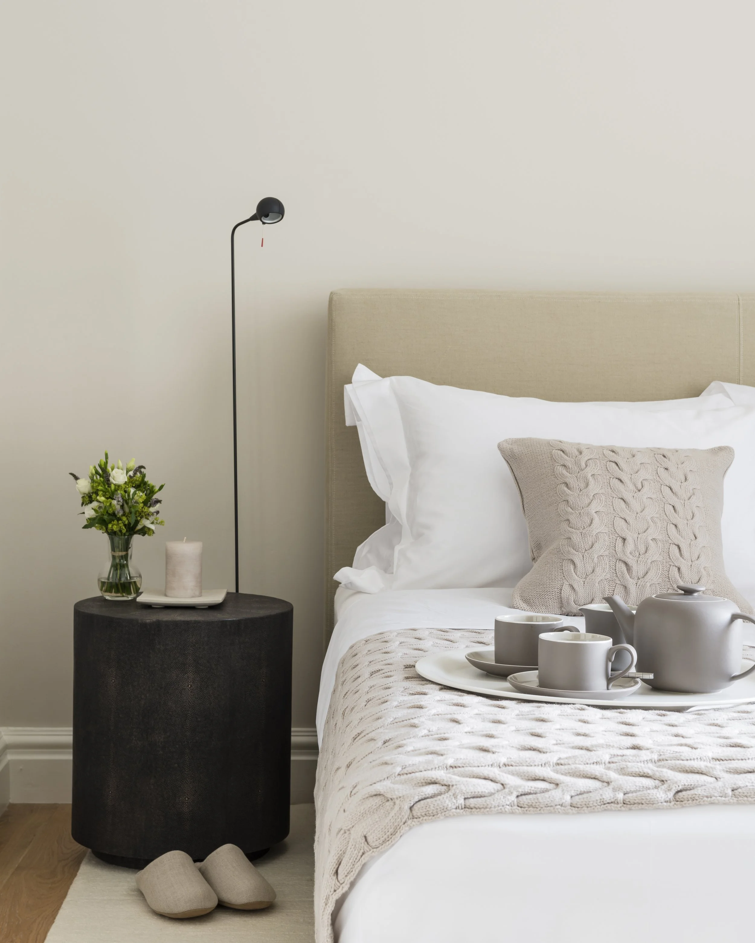 Linen upholstered bed, guest bedroom Lennox Gardens apartment