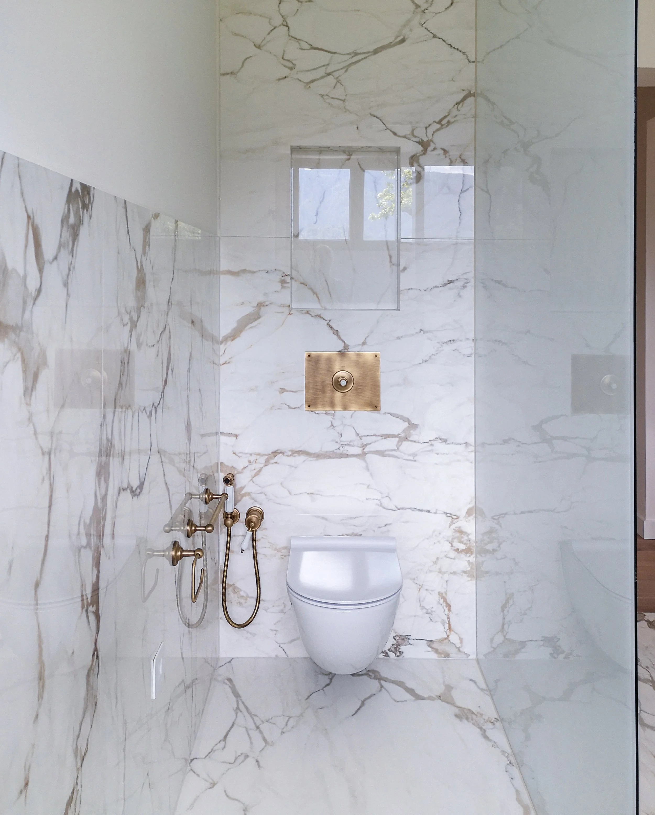 Calacatta Oro bathroom wc detail, Bled residence Slovenia