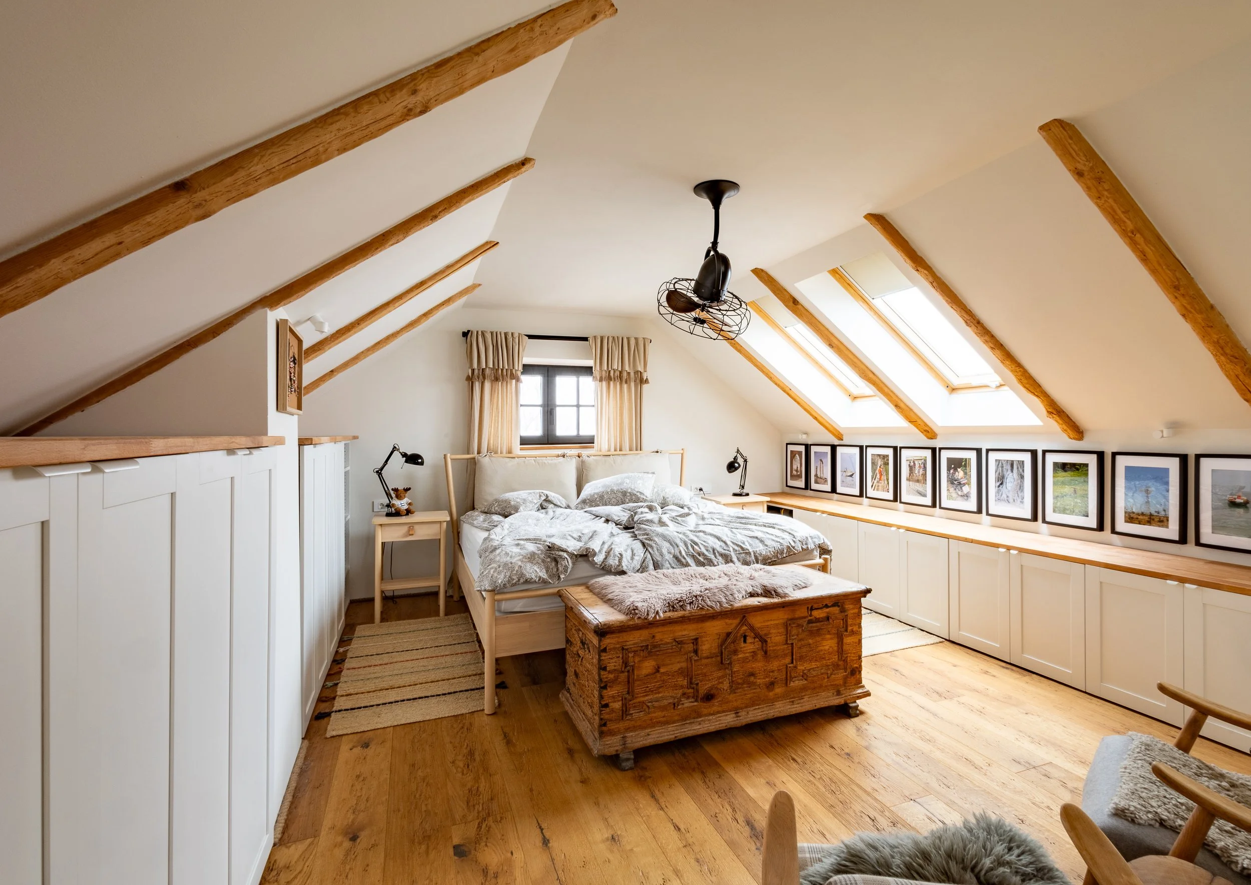 Attic bedroom with exposed beams, vineyard cottage Slovenia