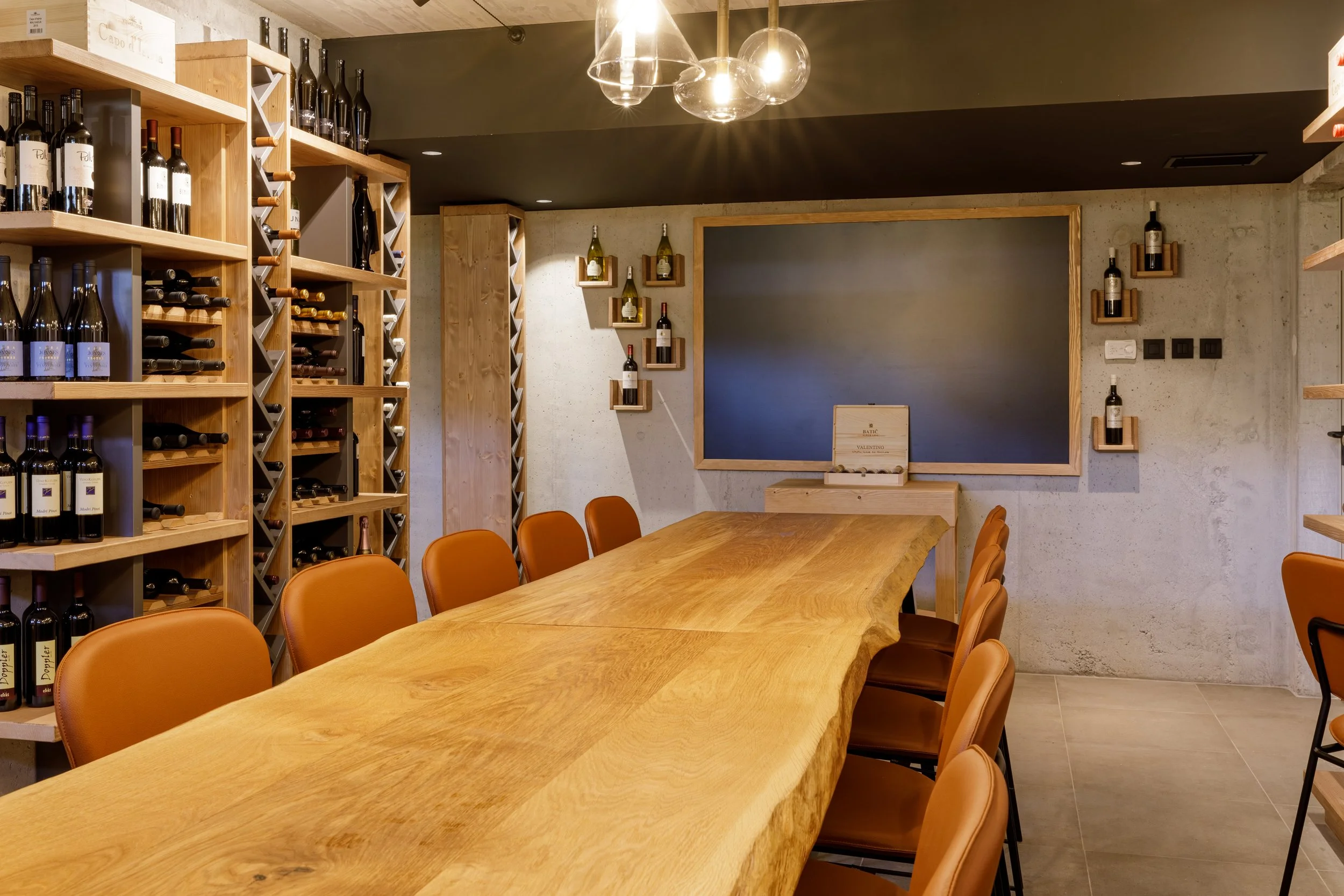 Live edge table in wine cellar tasting room Sunrose 7 boutique hotel Slovenia
