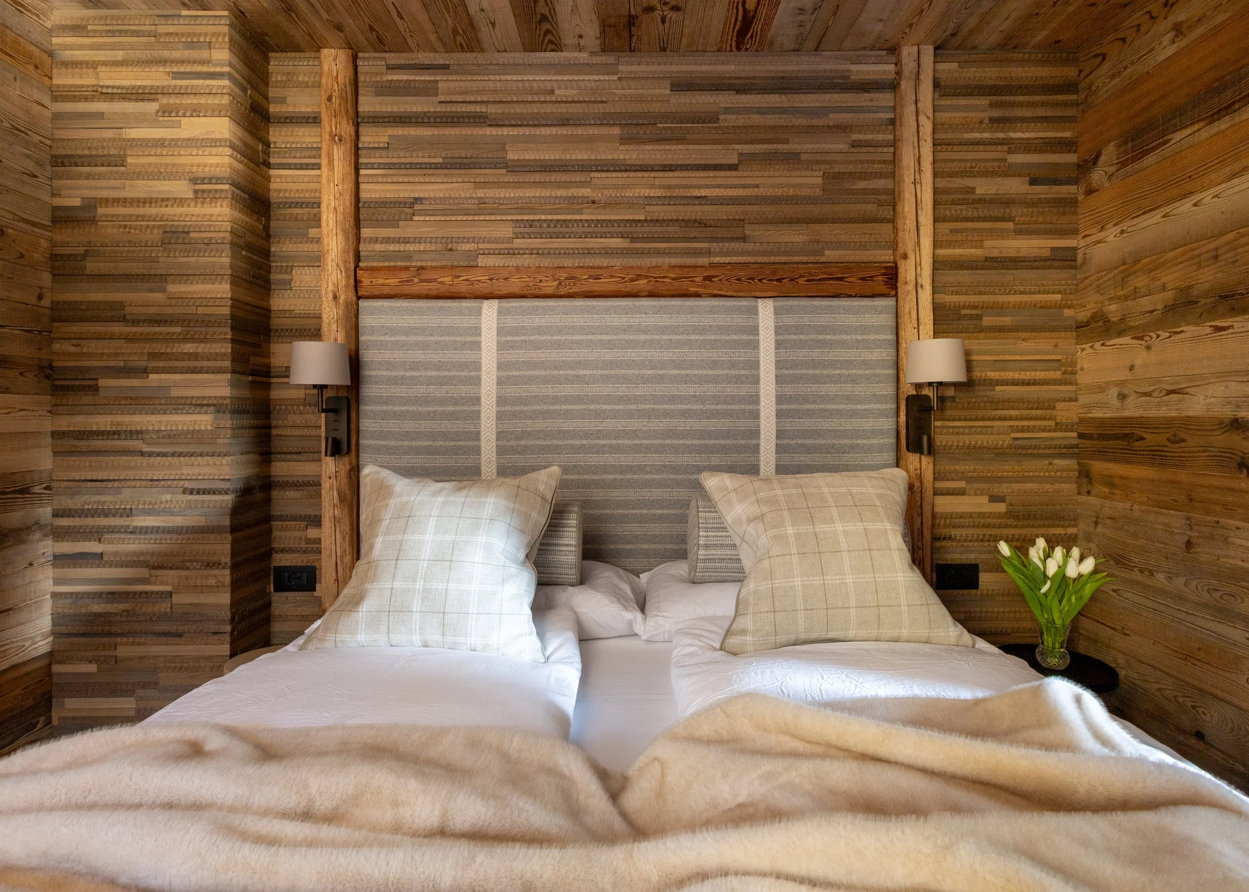 Wonderwall Studio sage bog oak wall panels and upholstered headboard, Julian Alps mountain chalet bedroom
