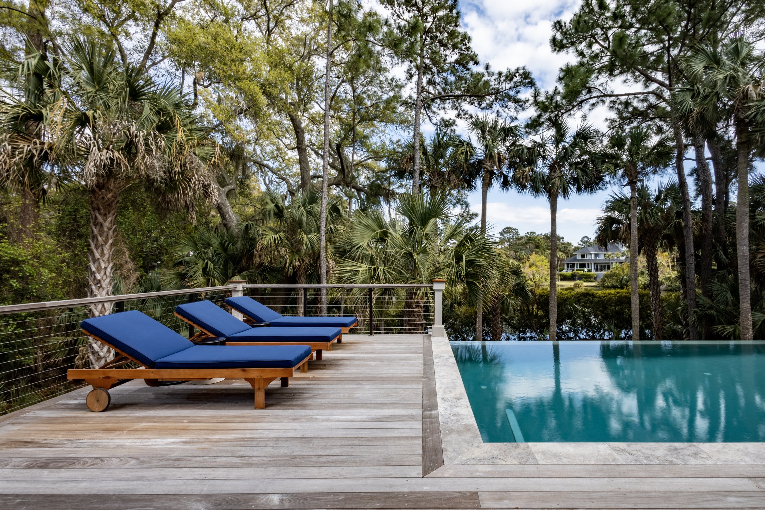 Blue loungers, pool deck Kiawah Island beach house