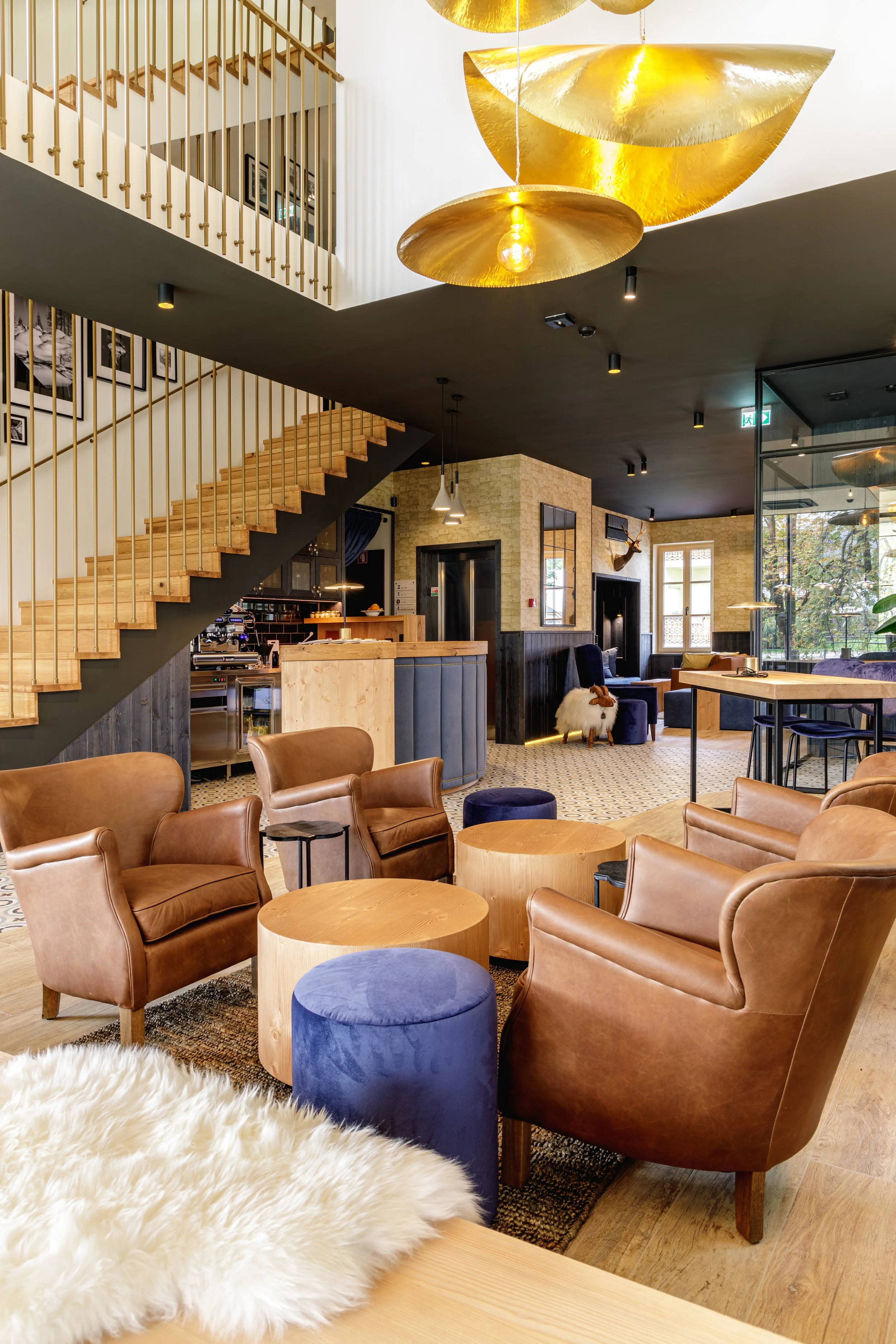 Leather armchairs reception lounge Sunrose 7 boutique hotel Slovenia