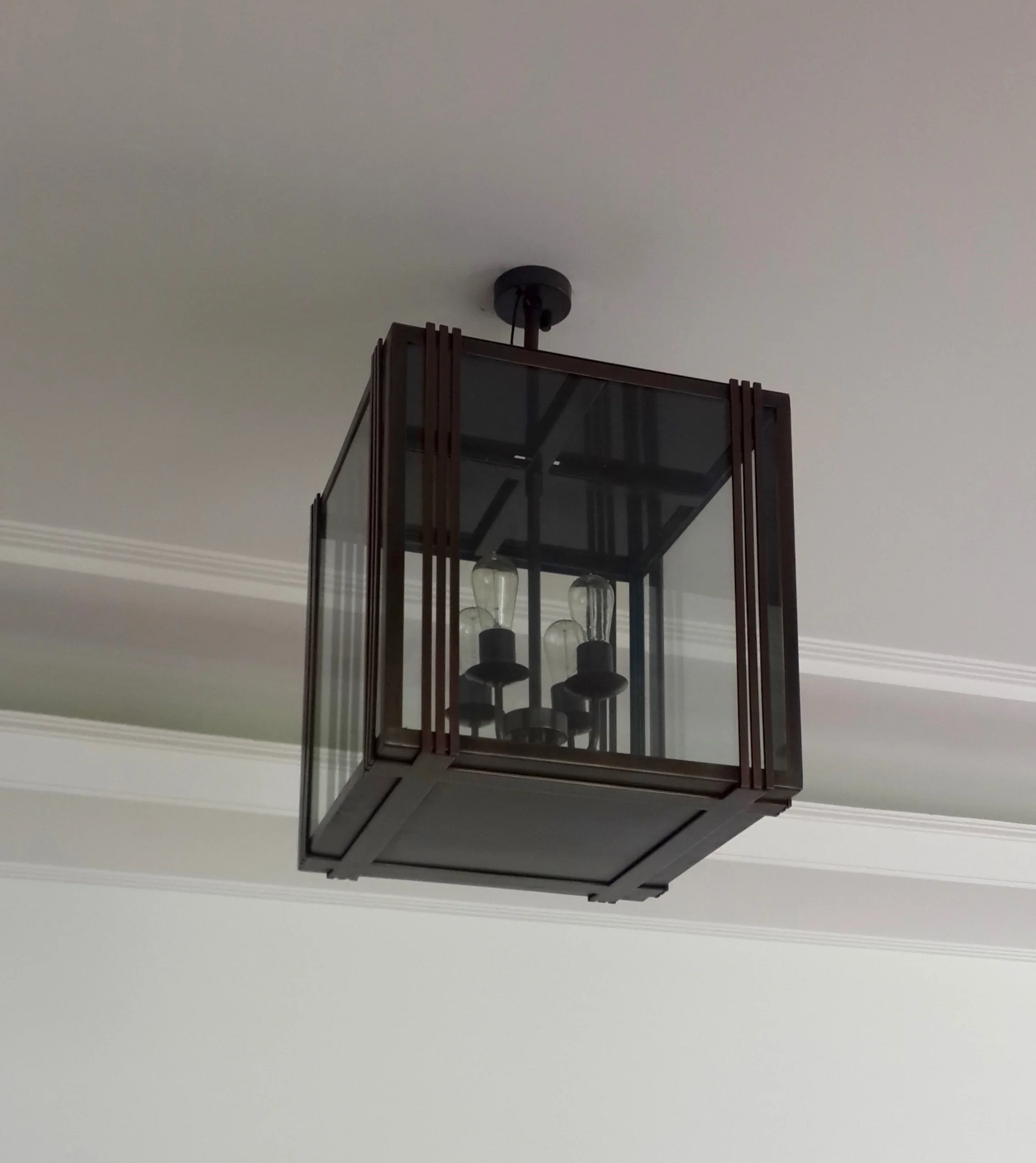 Bespoke bronze lantern, verandah Bandung residence
