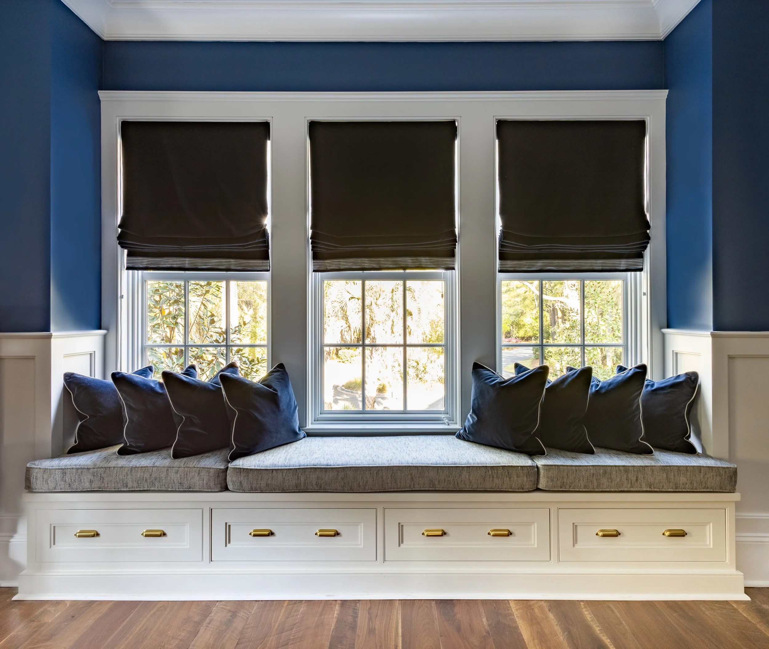 Blue cushions on window seat, games room Kiawah Island beach house