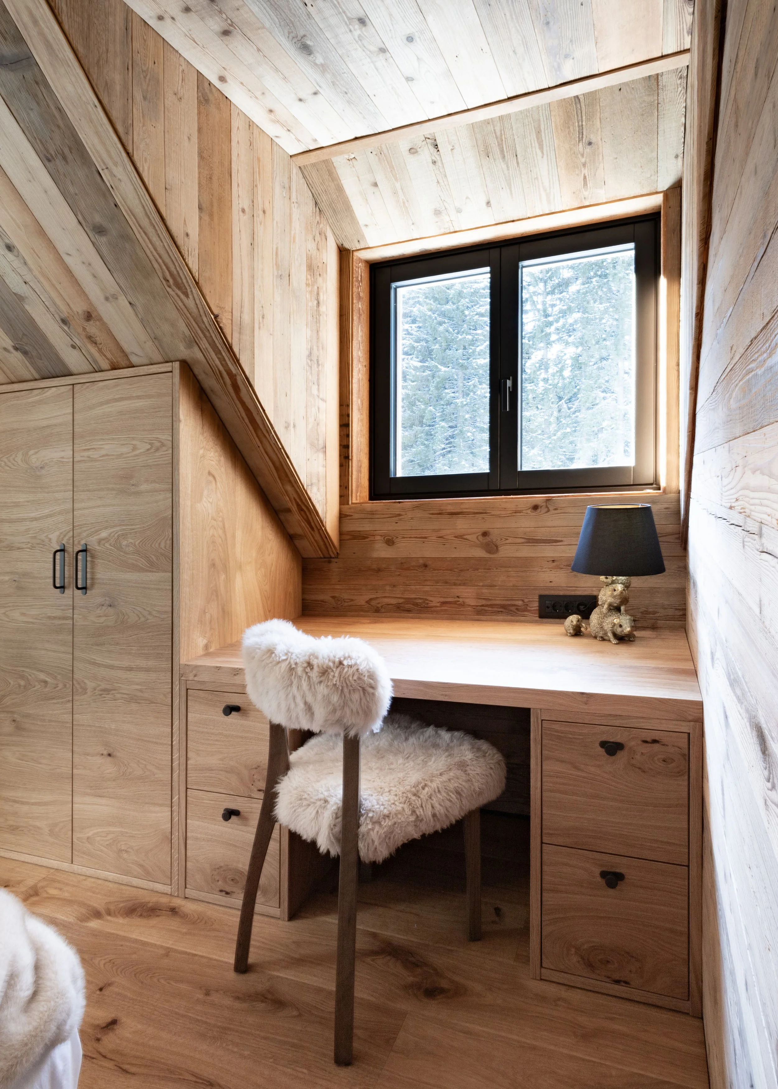 Sheepskin chair work space, Julian Alps mountain chalet bedroom