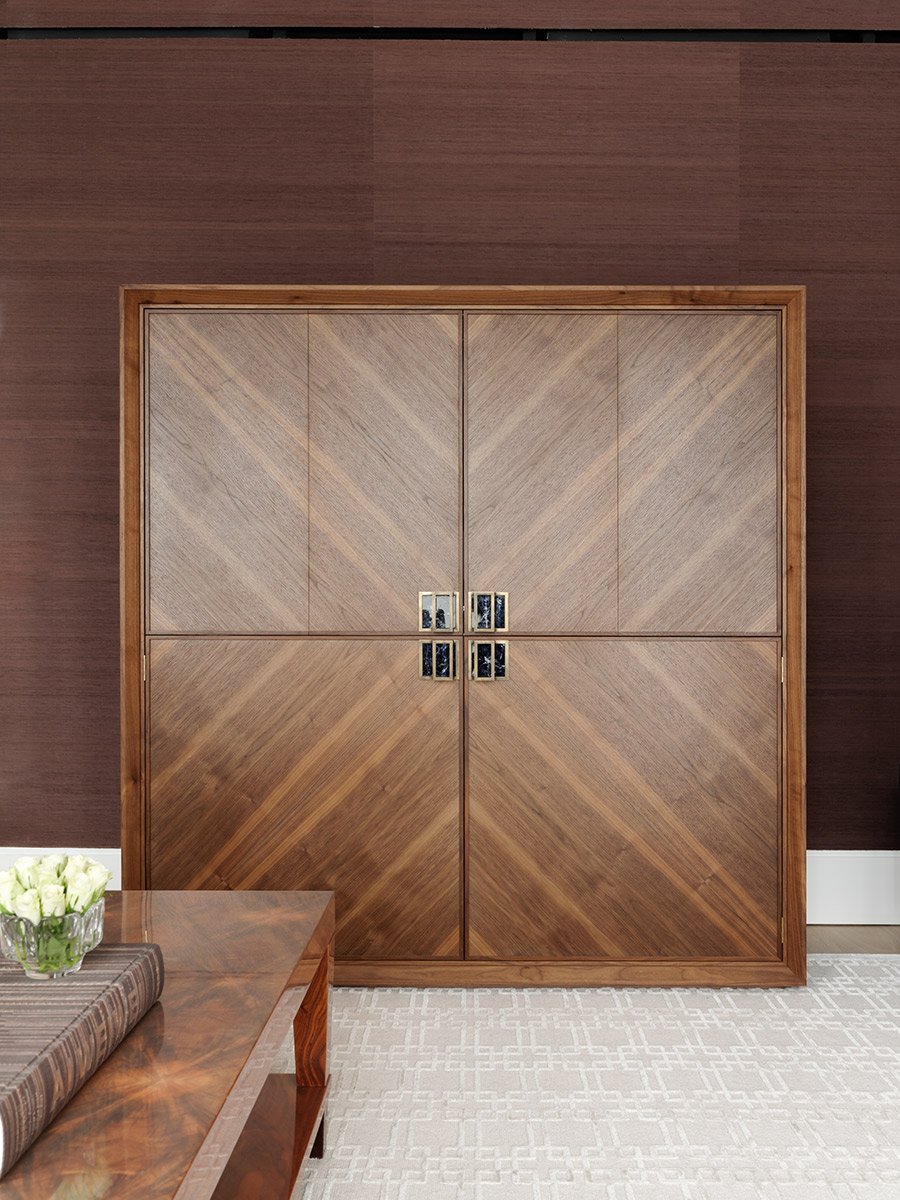 Bespoke sunburst walnut cabinet with brass and sodalite handles