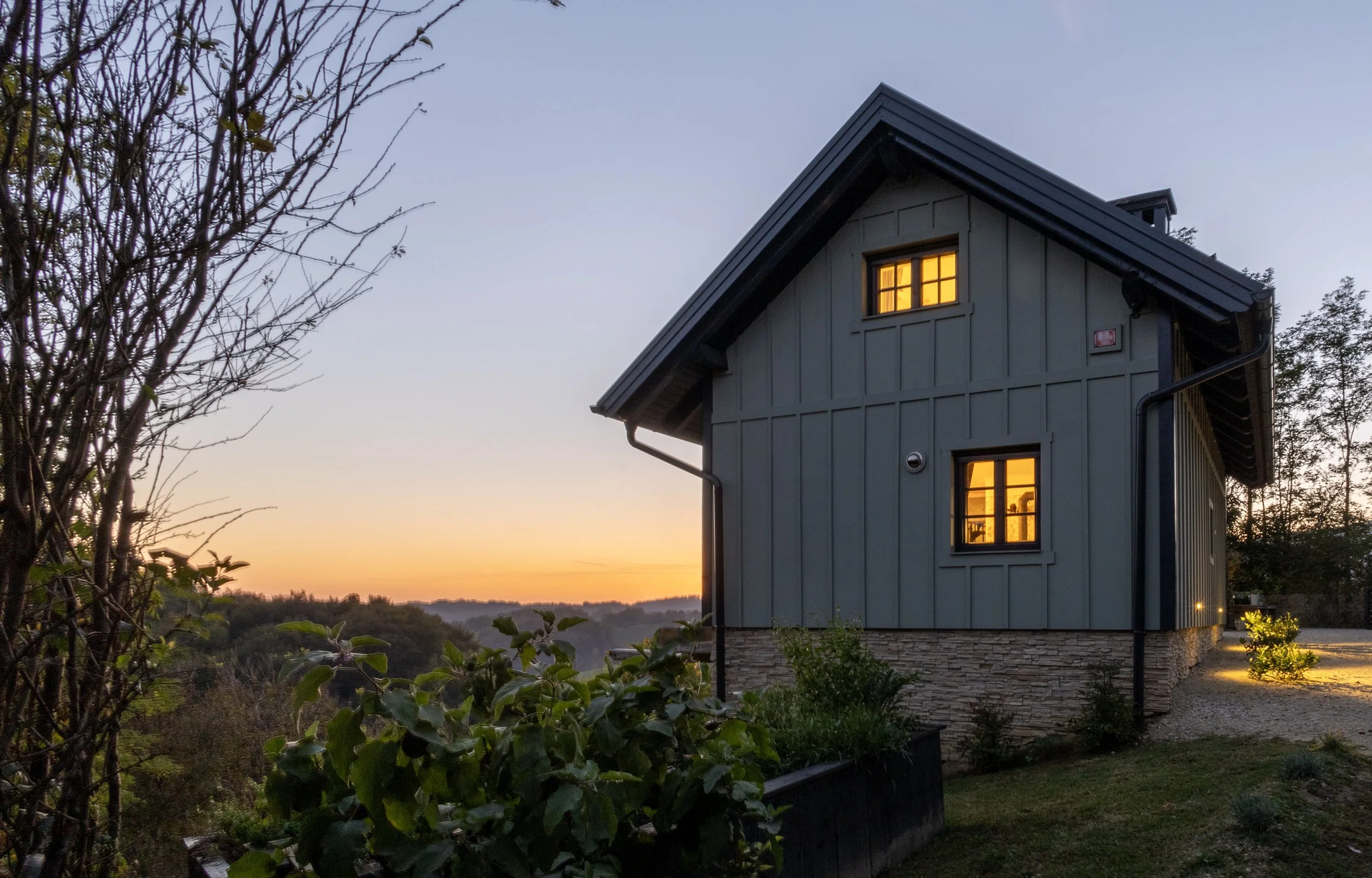 Baton and board clad exterior, vineyard cottage Slovenia