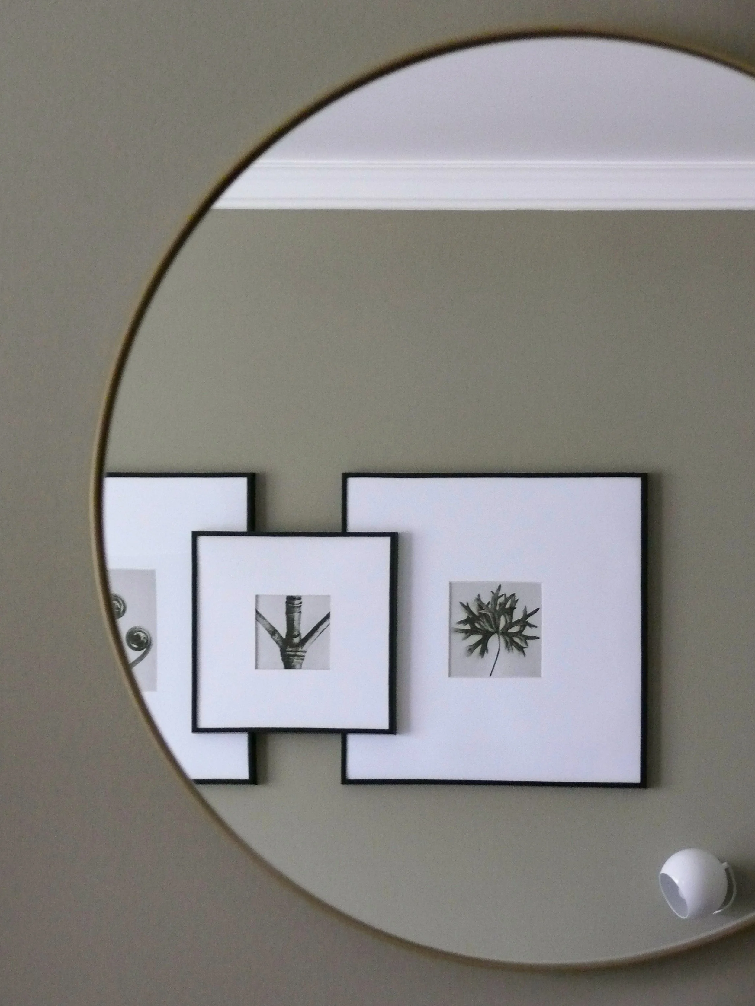 Mirror and artwork detail, bedroom, Hotel Rikli suites Bled Slovenia