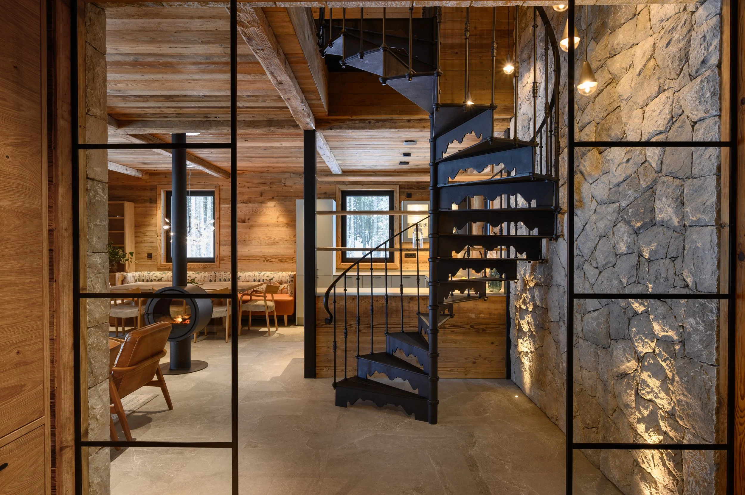 View from entrance hall to mountain chalet living room Julian Alps