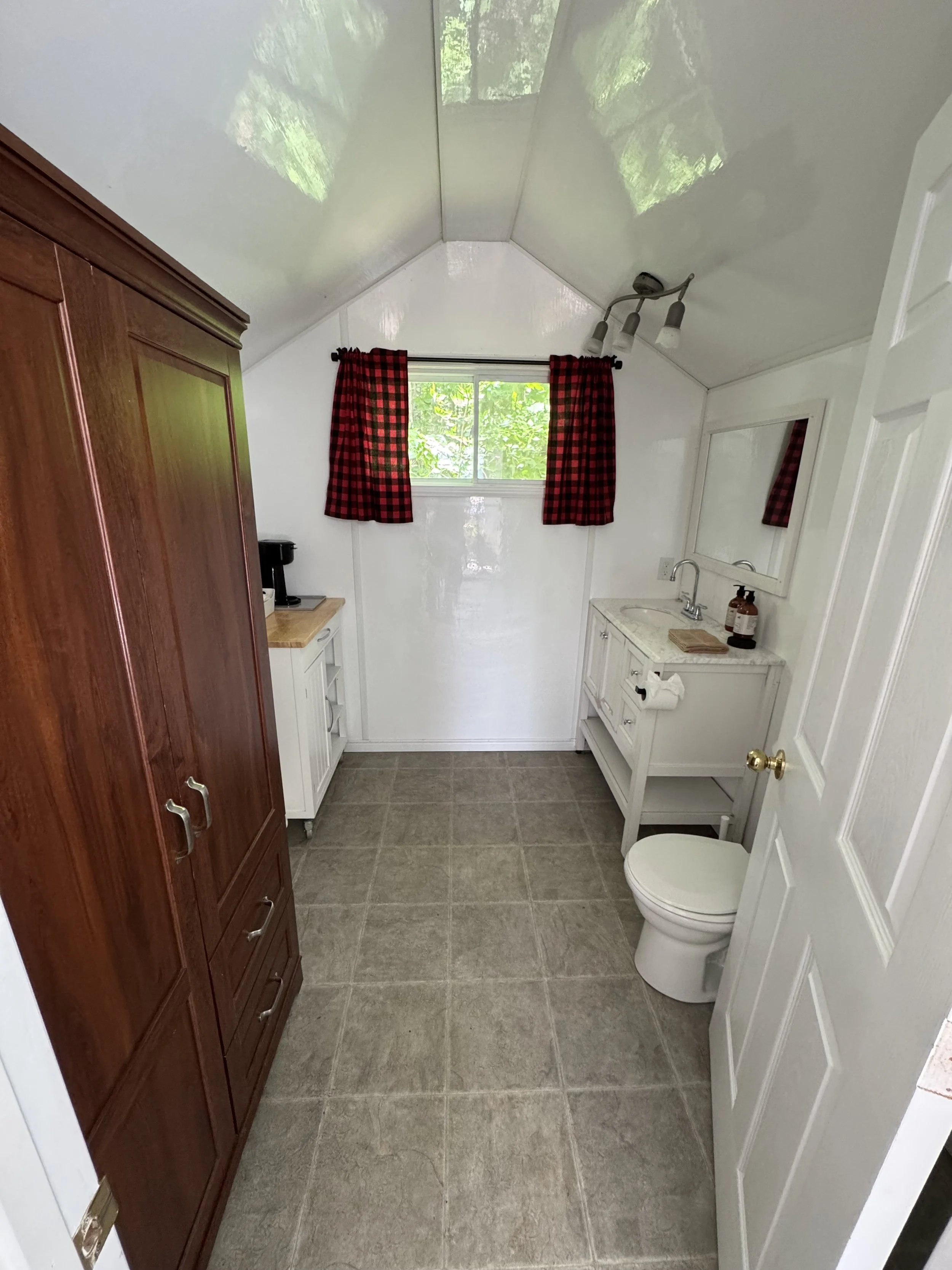 an interior image the bathroom in a Crash Cabin Deluxe at Whitewater BeerSpa
