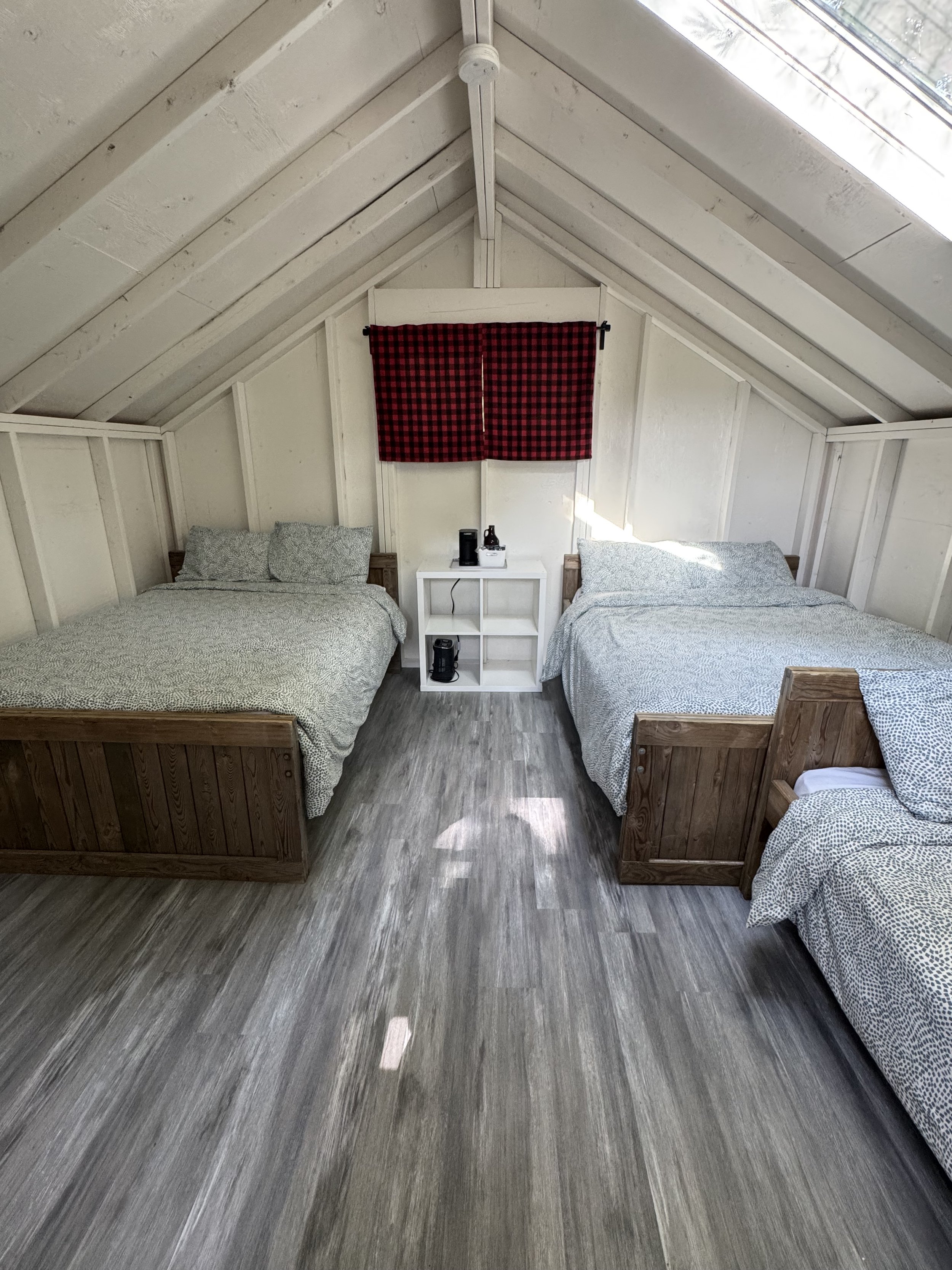 an interior image of a beds in a Crash Cabin Deluxe at Whitewater BeerSpa
