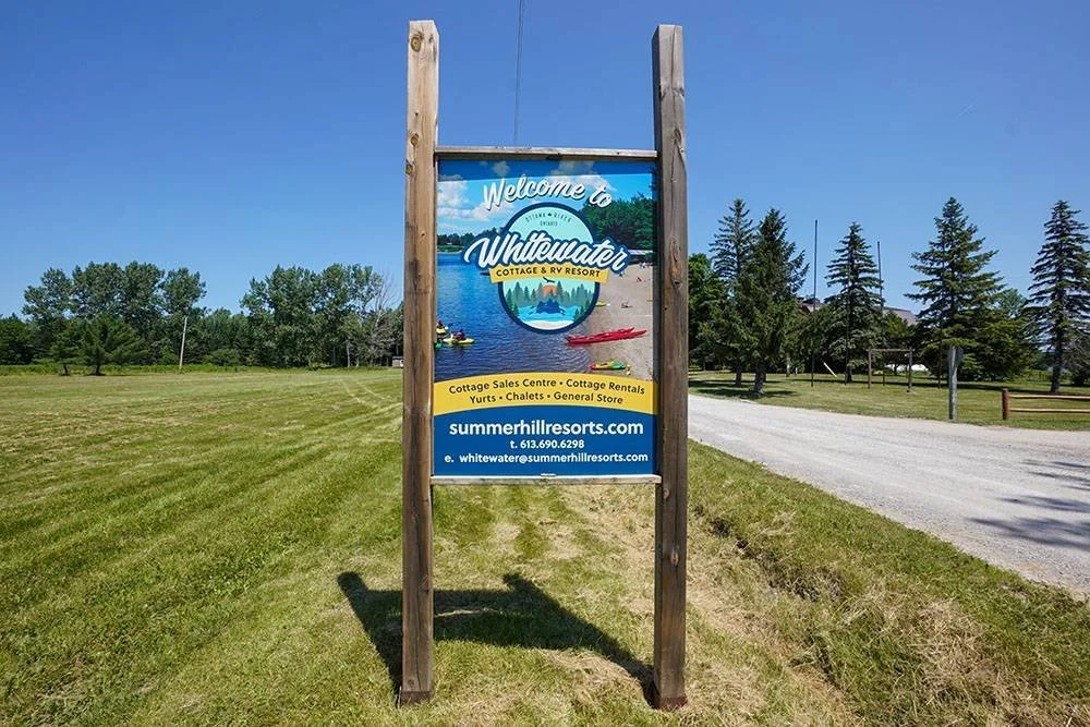 An image of the Welcome sign at Whitewater Cottage & RV Resort