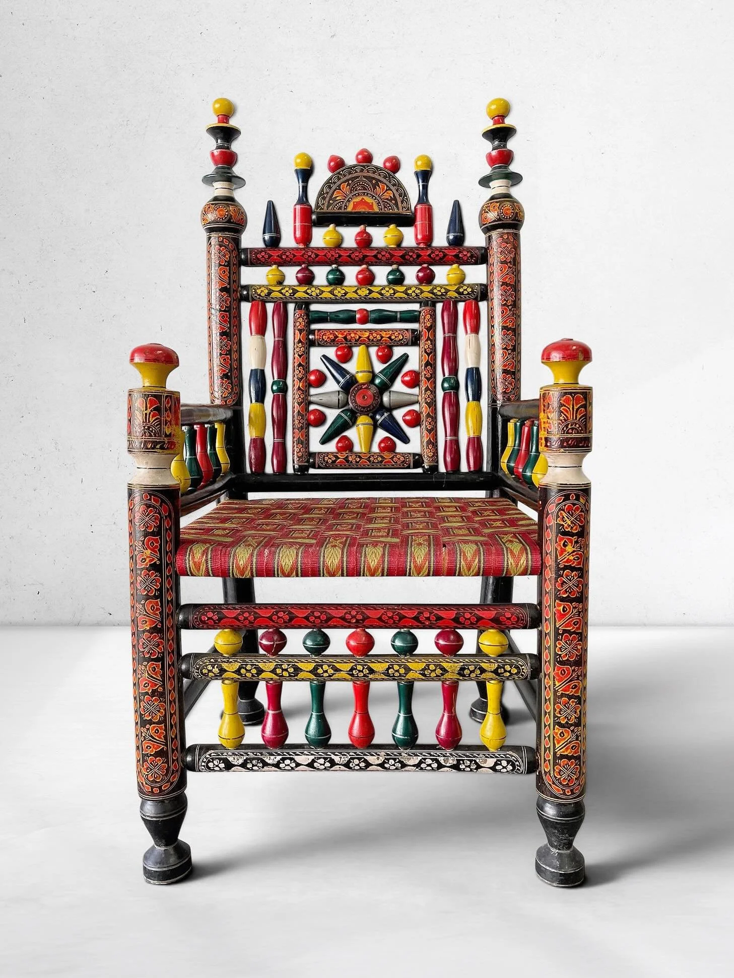 Vintage Hand-Painted Folk Art Ceremonial Accent Chair 

~~~~~~~~~~~~~~~~~~~~~~~~~

A striking vintage hand-painted folk art accent chair with exceptional decorative presence and craftsmanship. This piece features a tall architectural back, turned woo