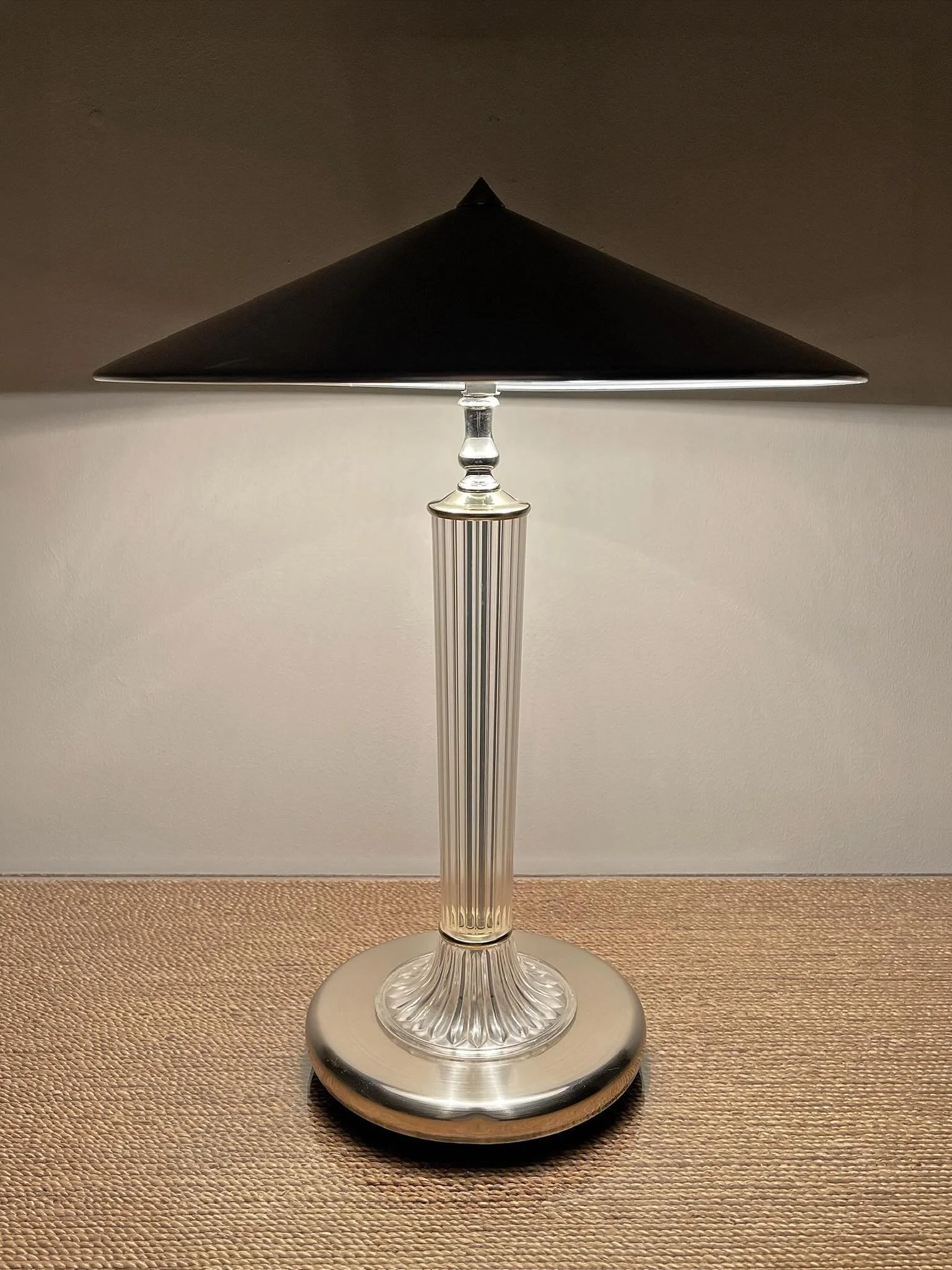 Vintage Modernist Ribbed Lucite &amp; Silver Mushroom Lamp

~~~~~~~~~~~~~~~~~~~~~~~~~

Elegant vintage table lamp with a refined modernist silhouette, featuring a ribbed clear lucite or acrylic column, polished chrome-tone base, and wide conical meta
