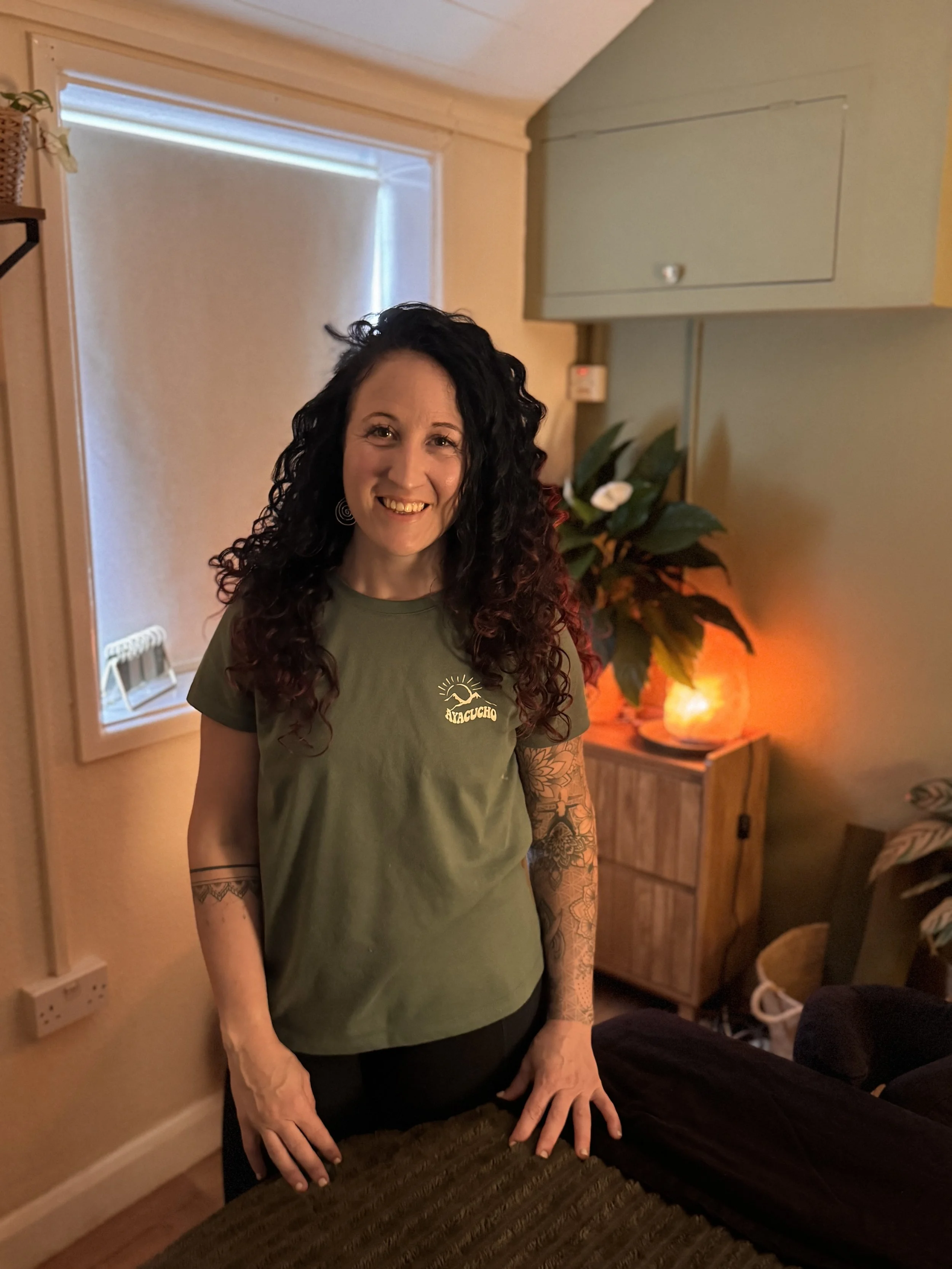 Laura in her wellbeing treatment room in Budleigh Salterton