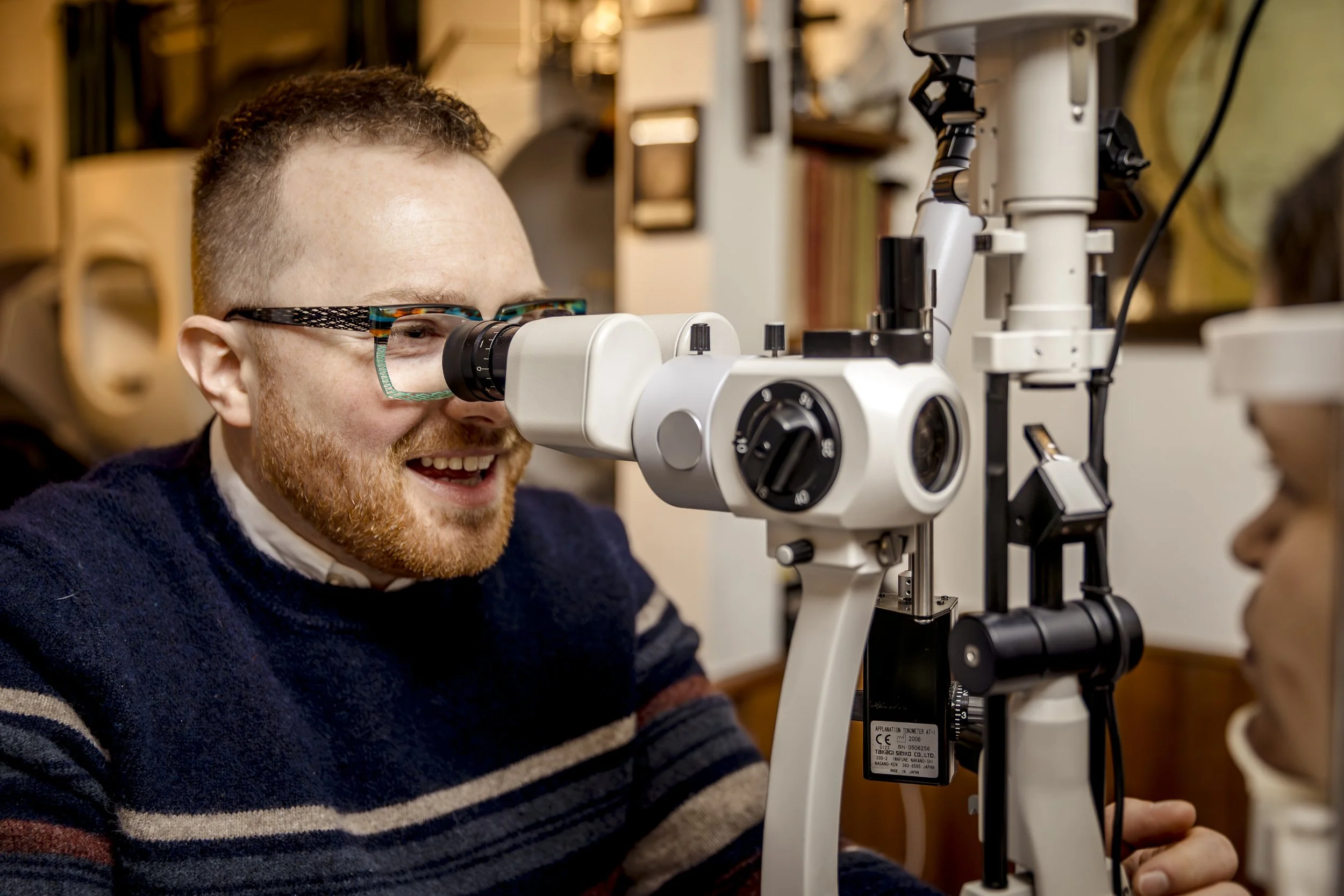 Prof. Christian French - Consulting Neuro-Optometrist performing a comprehensive clinical eye examination.
