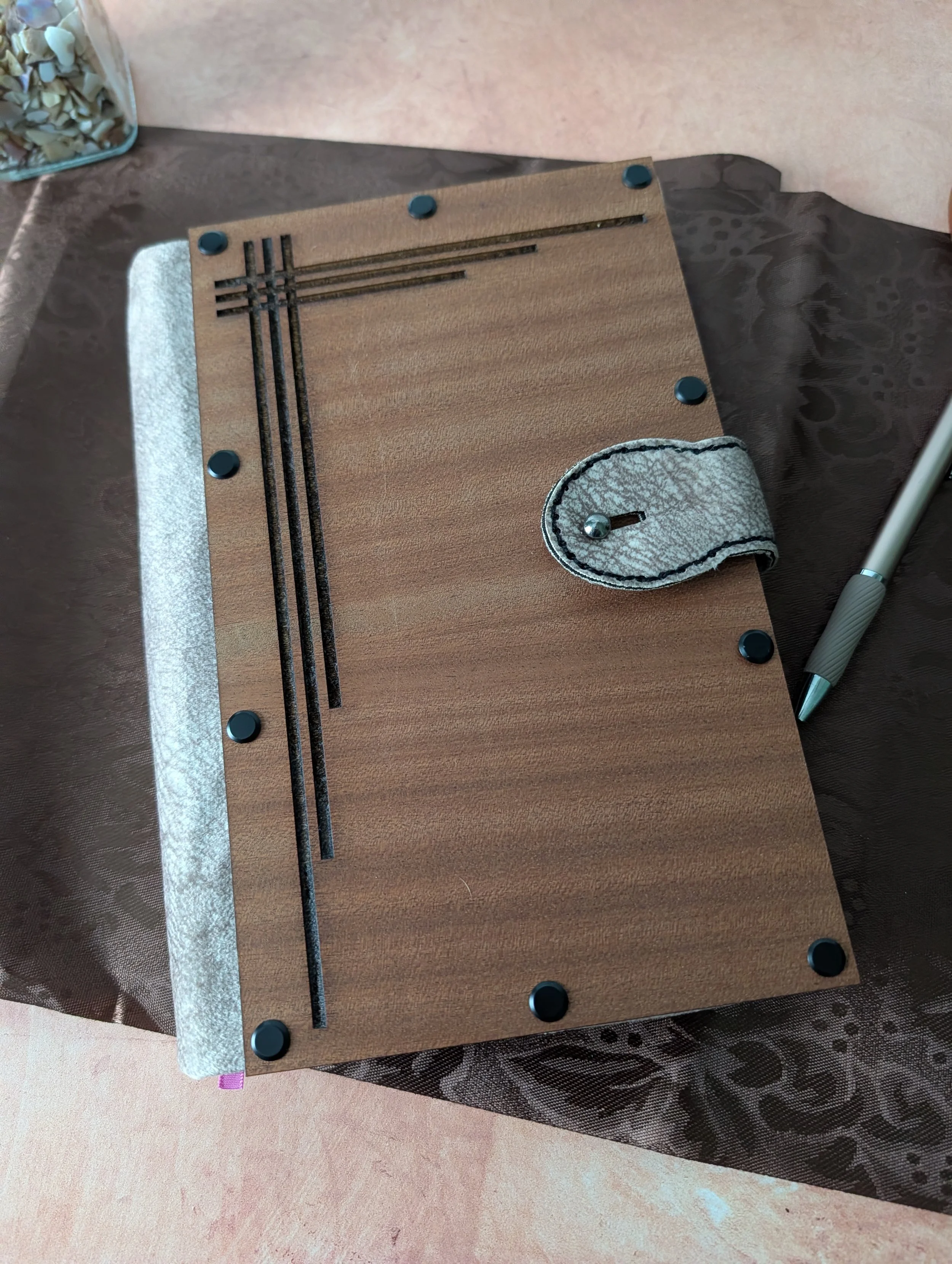 Walnut veneer cover with silver leatherette liner