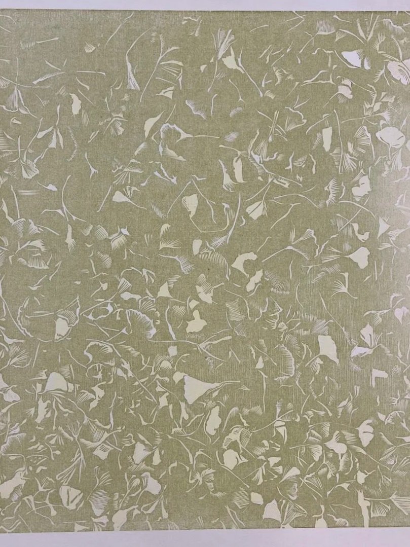 This print is a work in progress-- check back next week to see the final print! It is a five layer color reduction woodcut printed letterpress on lightly textured bright white paper. The reference image is a lawn entirely covered in ginkgo leaves. Th
