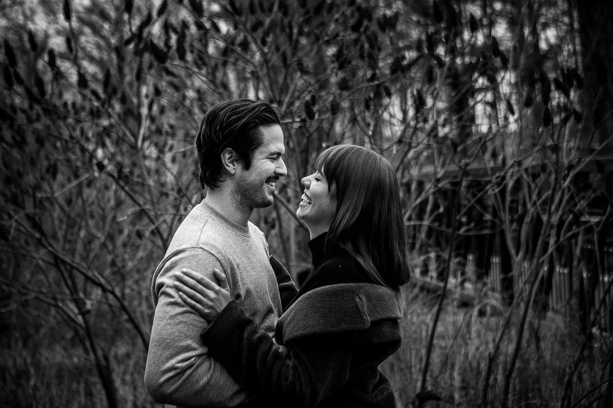 Laughing out loud while my love embraces me
