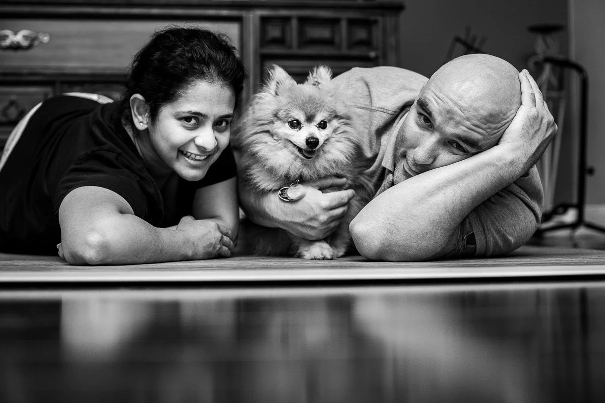 A candid portrait of Michael & Chats with their beautiful furbaby