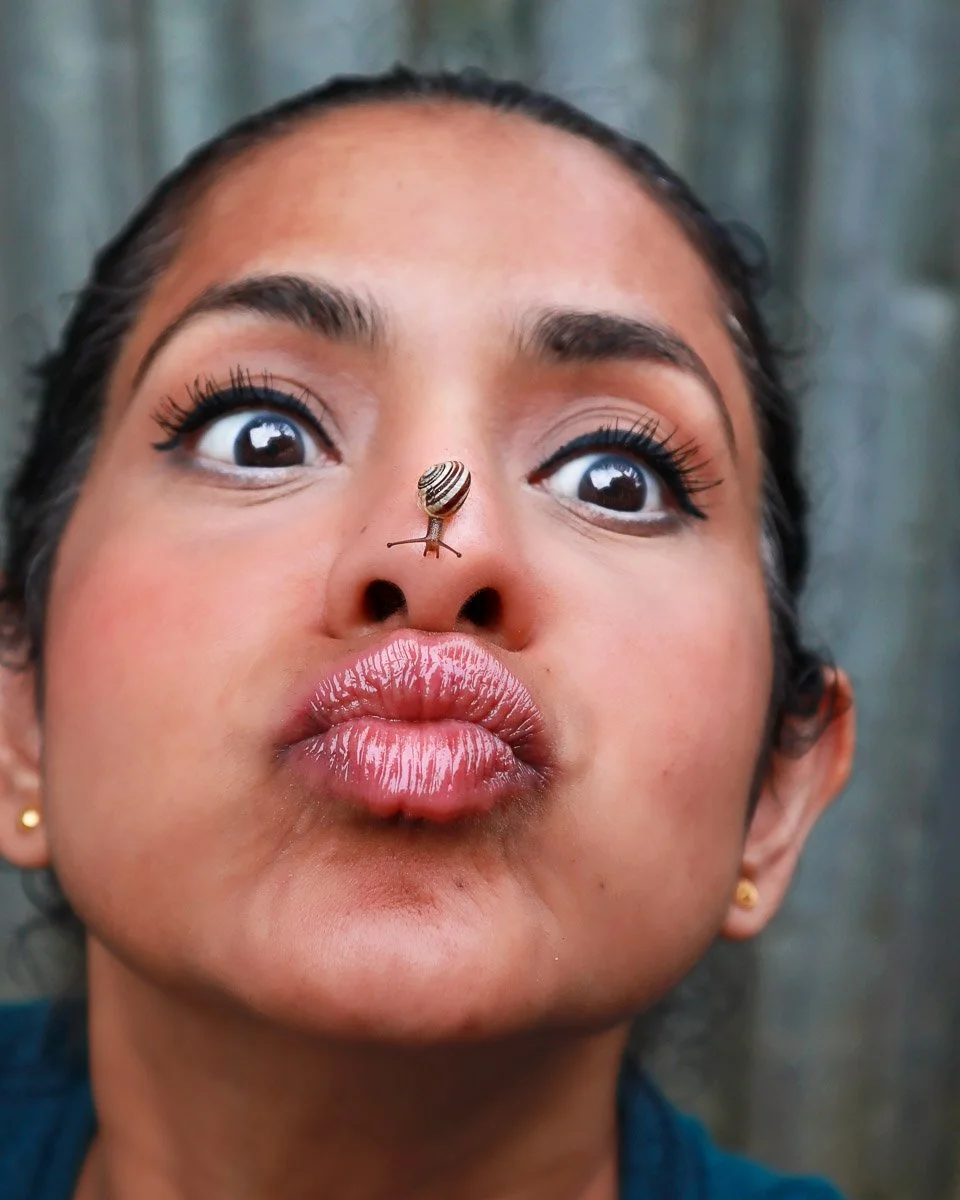 A portrait of me as a snail crawls on my nose